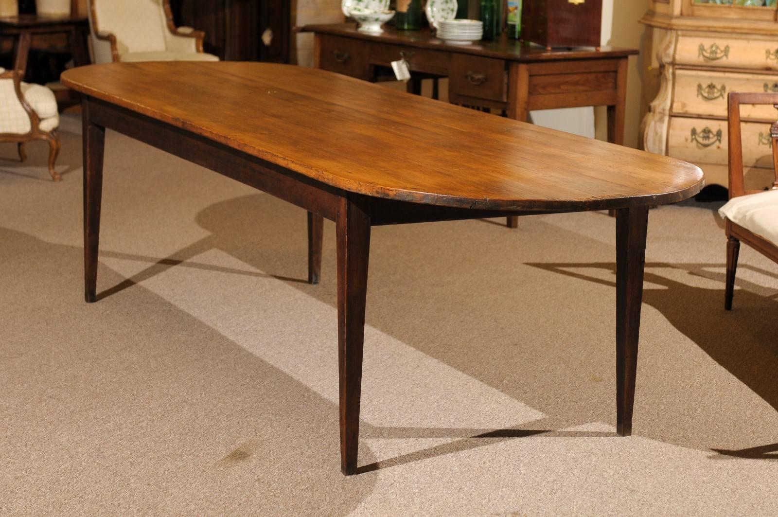 19th century long pine and oak oval farm table, circa 1860.
This is a great table! The racetrack shape gives you the overhang you need at each end to sit comfortably. The pine top is gorgeous in the honey tones and patina that you would love. The
