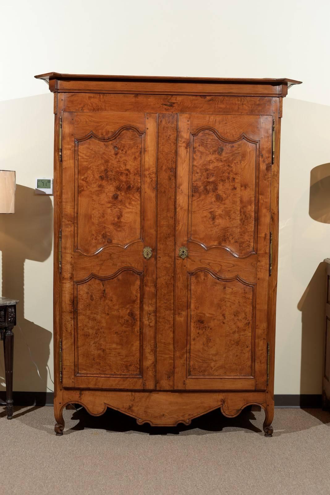 19th century French armoire in burled ash, circa 1850
This very handsome armoire grows on you. The burled wood is outstanding and the more you look at it the more you are impressed with the design the wood takes on. I also like the angled corners