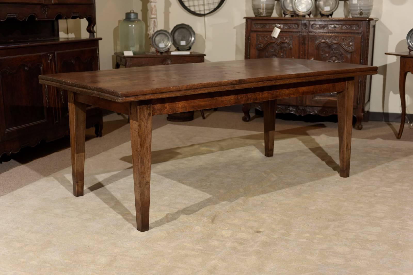 19th century French farm table, circa 1870
We've never seen a farm table with a double top! The double top gives the table an extra dimension. The table came from Brittany and has a nice patina along with a warm color brown. Another distinction