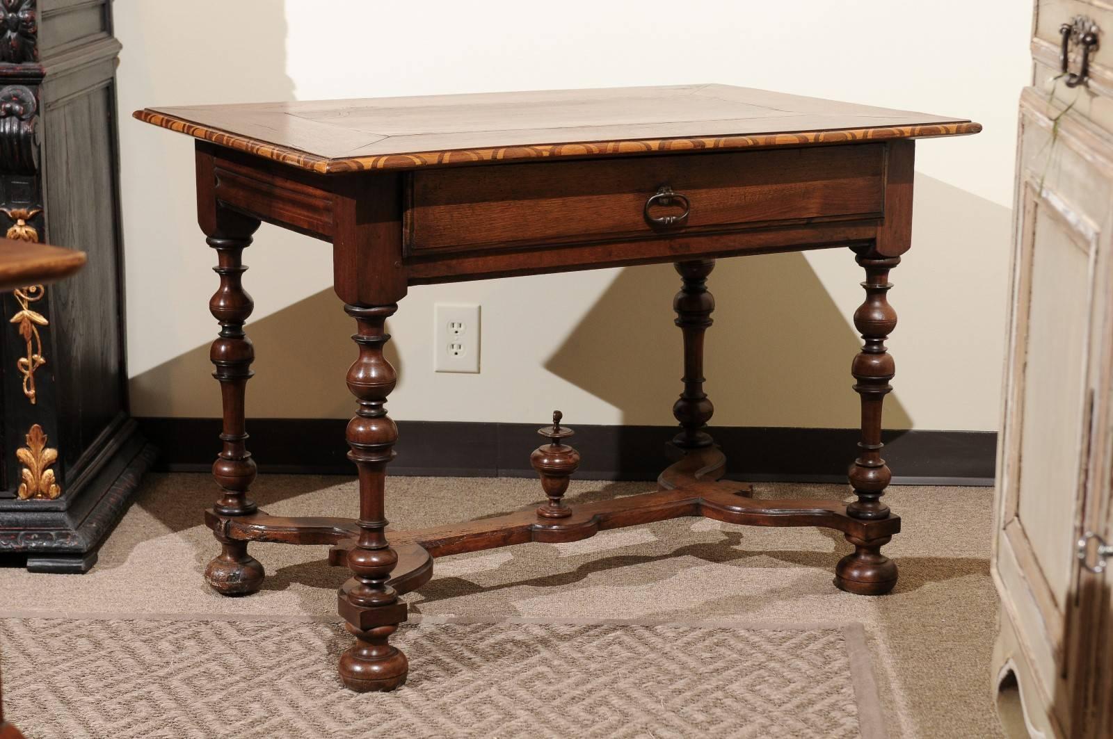 18th century French walnut side table, circa 1790
A charming table with a simple inlay design on the top. The turned legs and stretcher make this table interesting as well.
