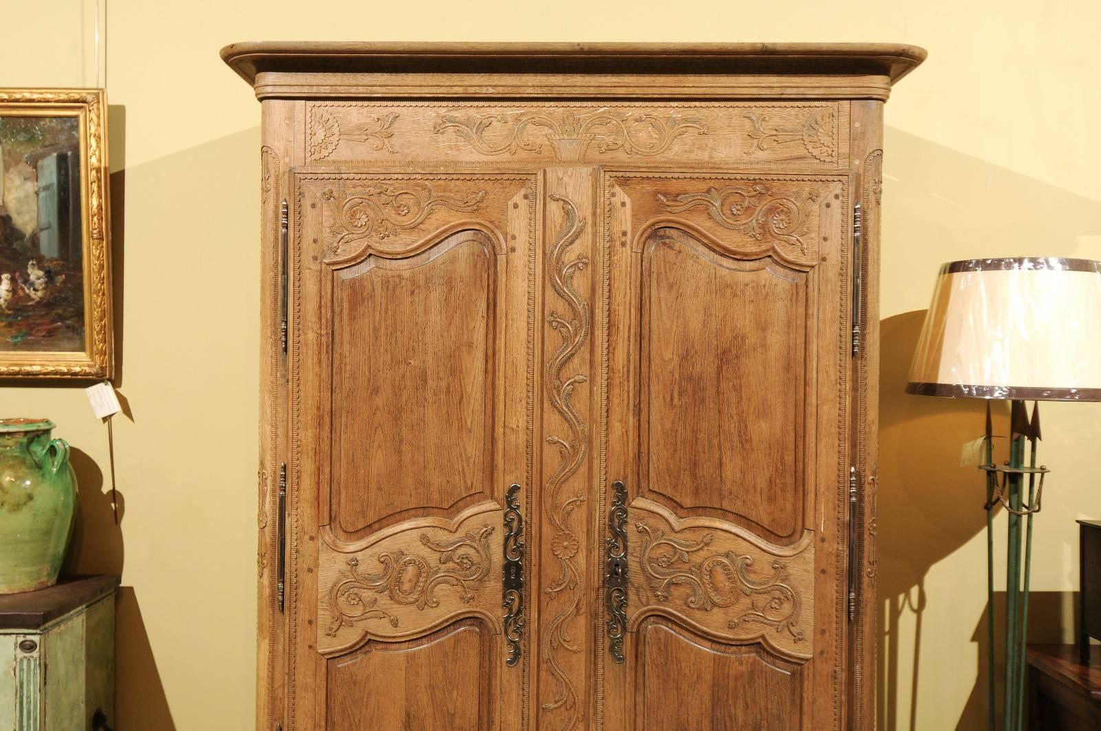 French 19th Century Carved Oak Armoire from Normandy For Sale