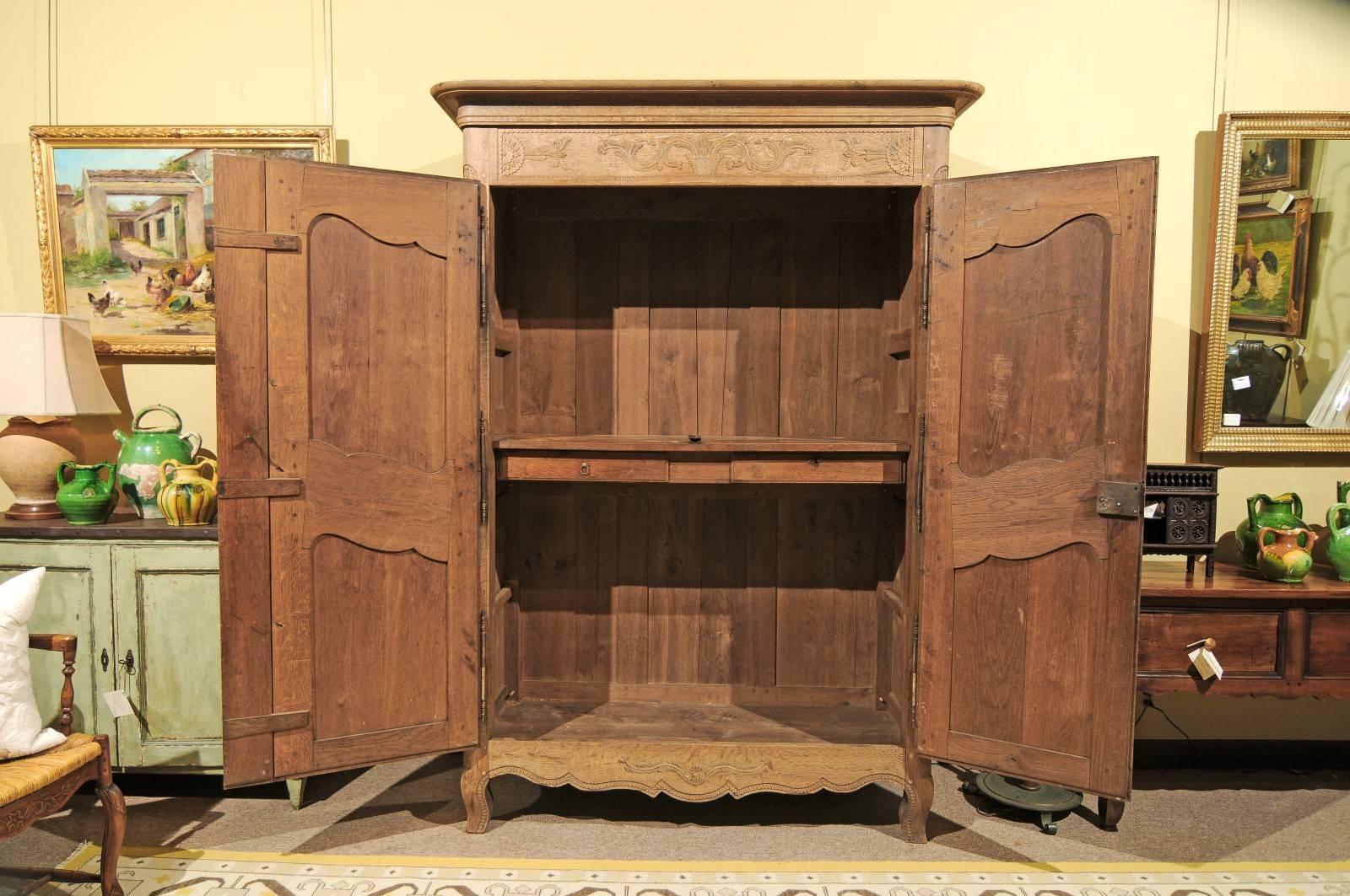 Iron 19th Century Carved Oak Armoire from Normandy For Sale