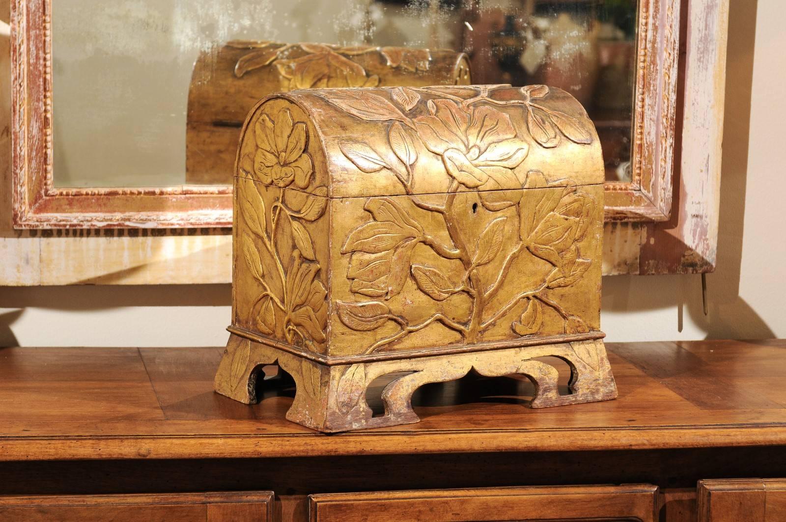 Period Art Nouveau gilded wood coffer, circa 1900.

This is an eye-catching accessory just right for a spot that needs something wonderful. Years of handling have given it an exceptional patina with some bright highlights and an overall glow. The