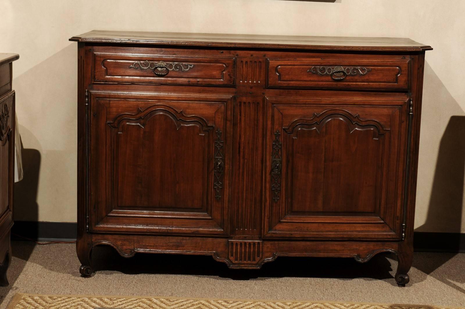 Transitional Louis XV-VI Style cherry buffet, circa 1860

Years of waxing and hand polishing have added a rich color and patina to this substantial buffet. It is large enough to provide a good amount of storage and ample surface for serving. The