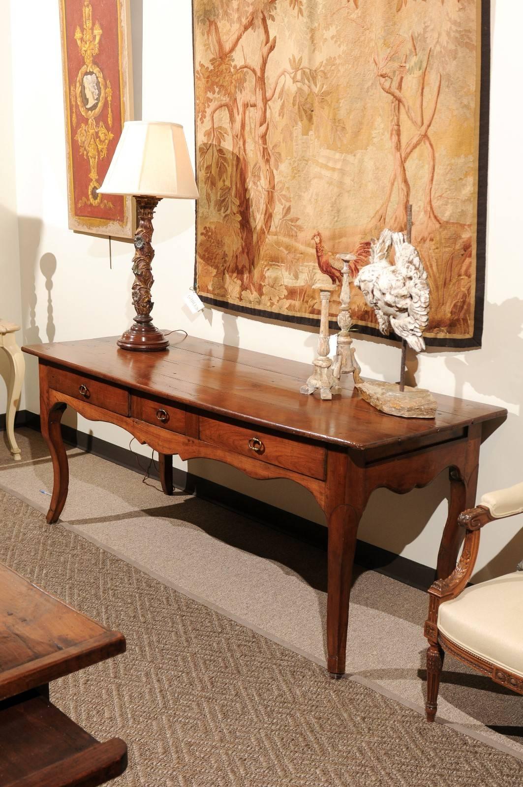 19th century Louis XV style cherry console table, circa 1870
This is one of my favourite tables in the store right now. It has a planked top with beautiful patina. The Louis XV style is noted in the curvy apron and cabriole legs. The table has a