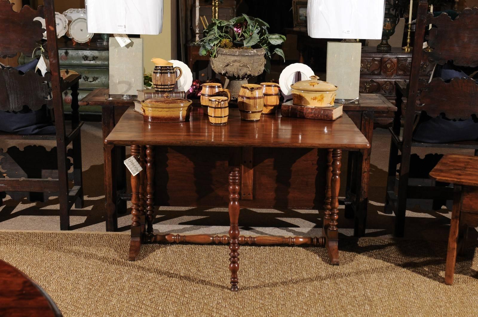 19th century walnut French gate-leg table, circa 1890
This is a most unique table. We have never come across a French gate-leg table like this one. The walnut is beautiful with a rich patina and once opened the gorgeous wood is really appreciated.