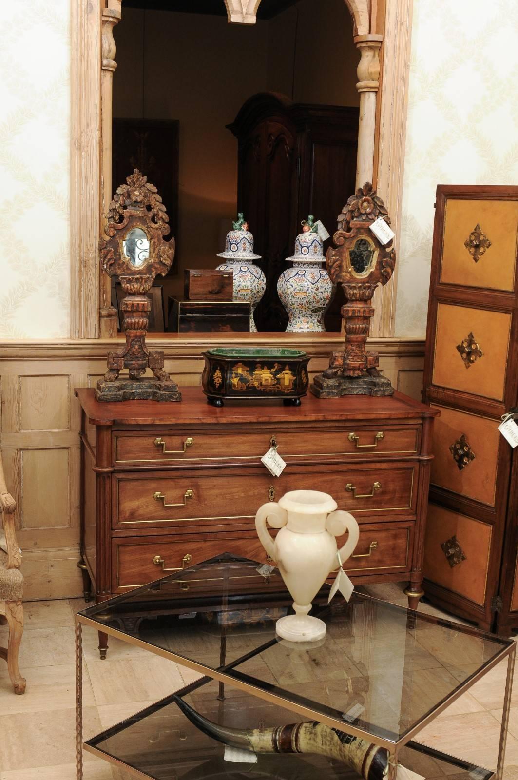 Period Louis XVI cherry commode, circa 1880
A lovely example of the fine Louis XVI craftsmanship of the period. The bronze hardware and banding around each drawer along with caps on the legs highlight the straight lines of this style. A simply