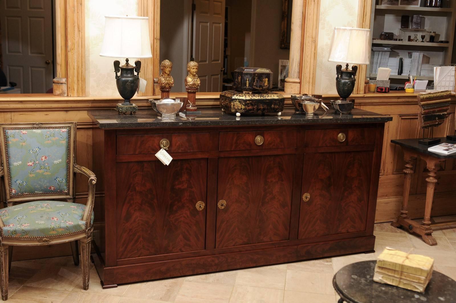 19th century mahogany Empire style Enfilade with marble top, circa 1880

One can't help but appreciate the craftsmanship required to create the beautiful mahogany book matched veneer on this piece. Even the insides of the door are veneered. The