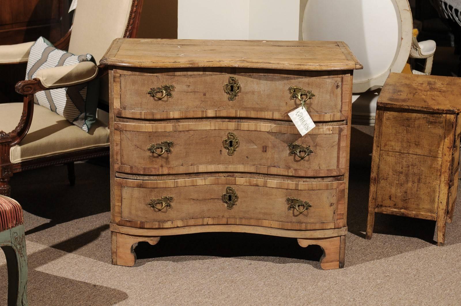 19th Century German Chest with Serpentine Front, Circa 1880
This chest has an interesting look which will appeal to a more rustic style project.  The wood seems to have been bleached to give it a lighter color.  The chest has several nice details