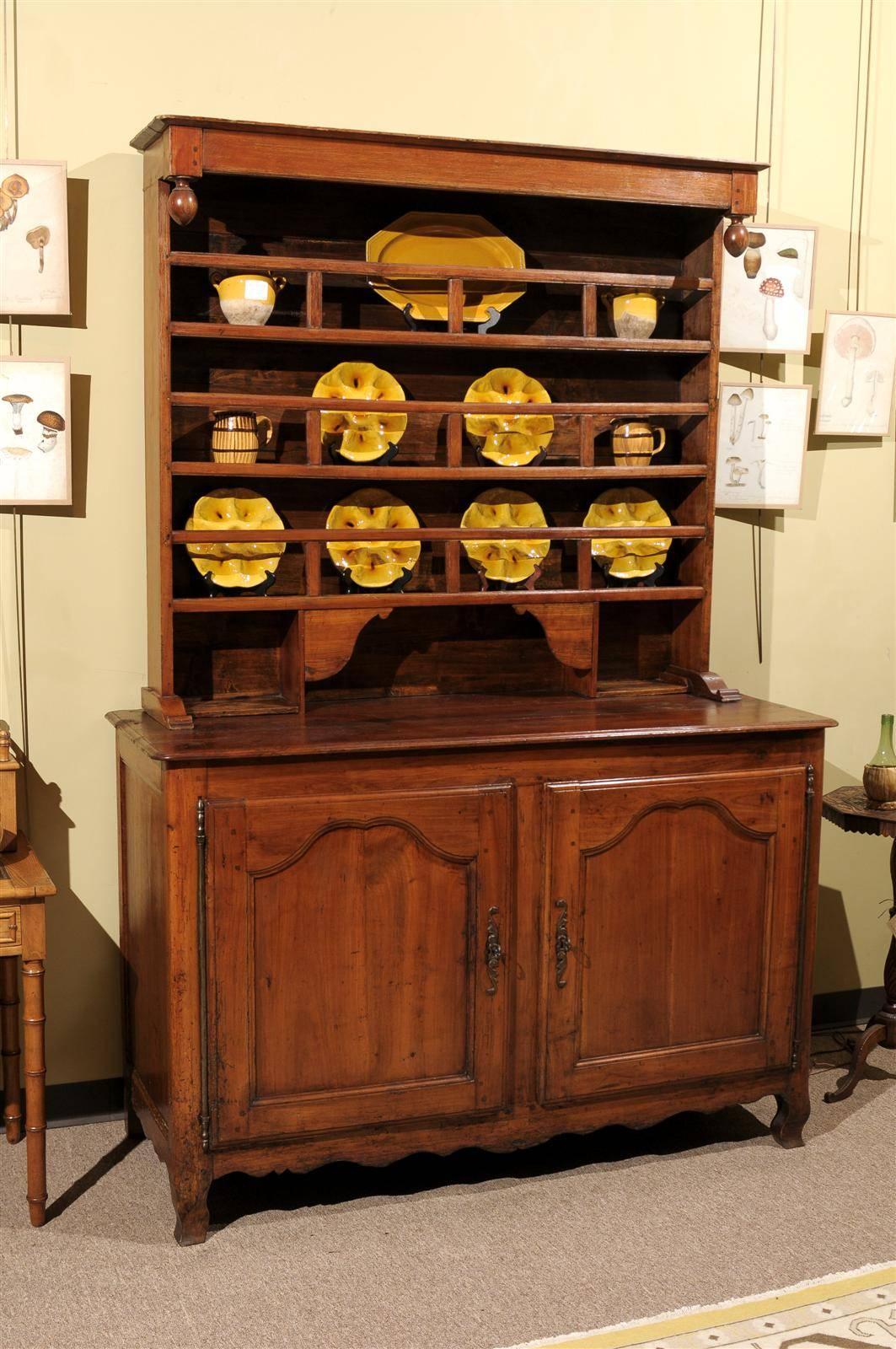 19th Century French Vaisselier in Cherry, circa 1880
There is a good amount of storage on the bottom here and spacious shelves above for display. The French would have used this piece in the kitchen or dining room and would have stored their plates