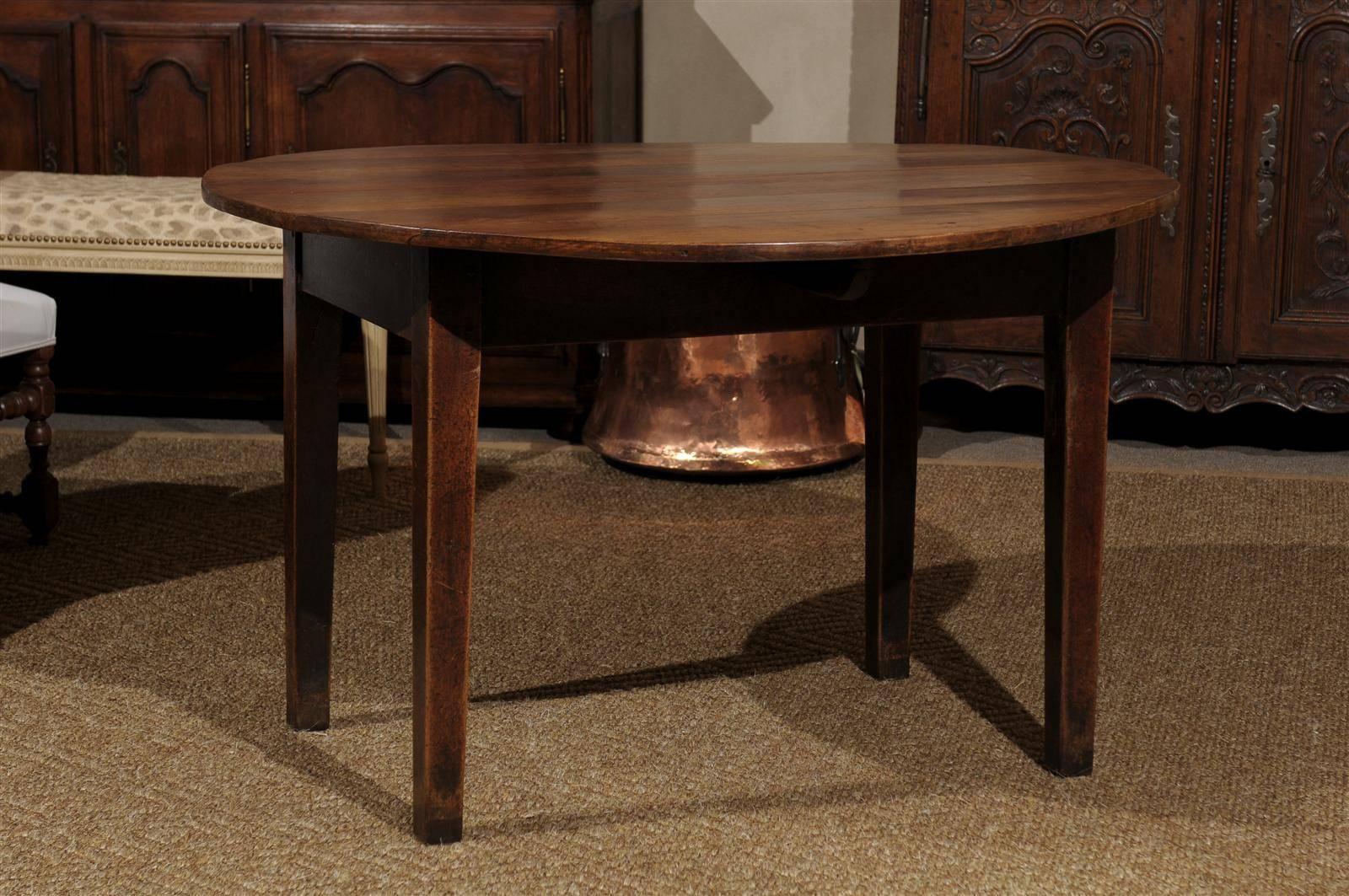 From the  beautiful region of Brittany, this table was lovingly made with local cherry wood.  Practical use is what this table is use to.  The table can easily fit six.  The grain of the wood makes the top very inviting.