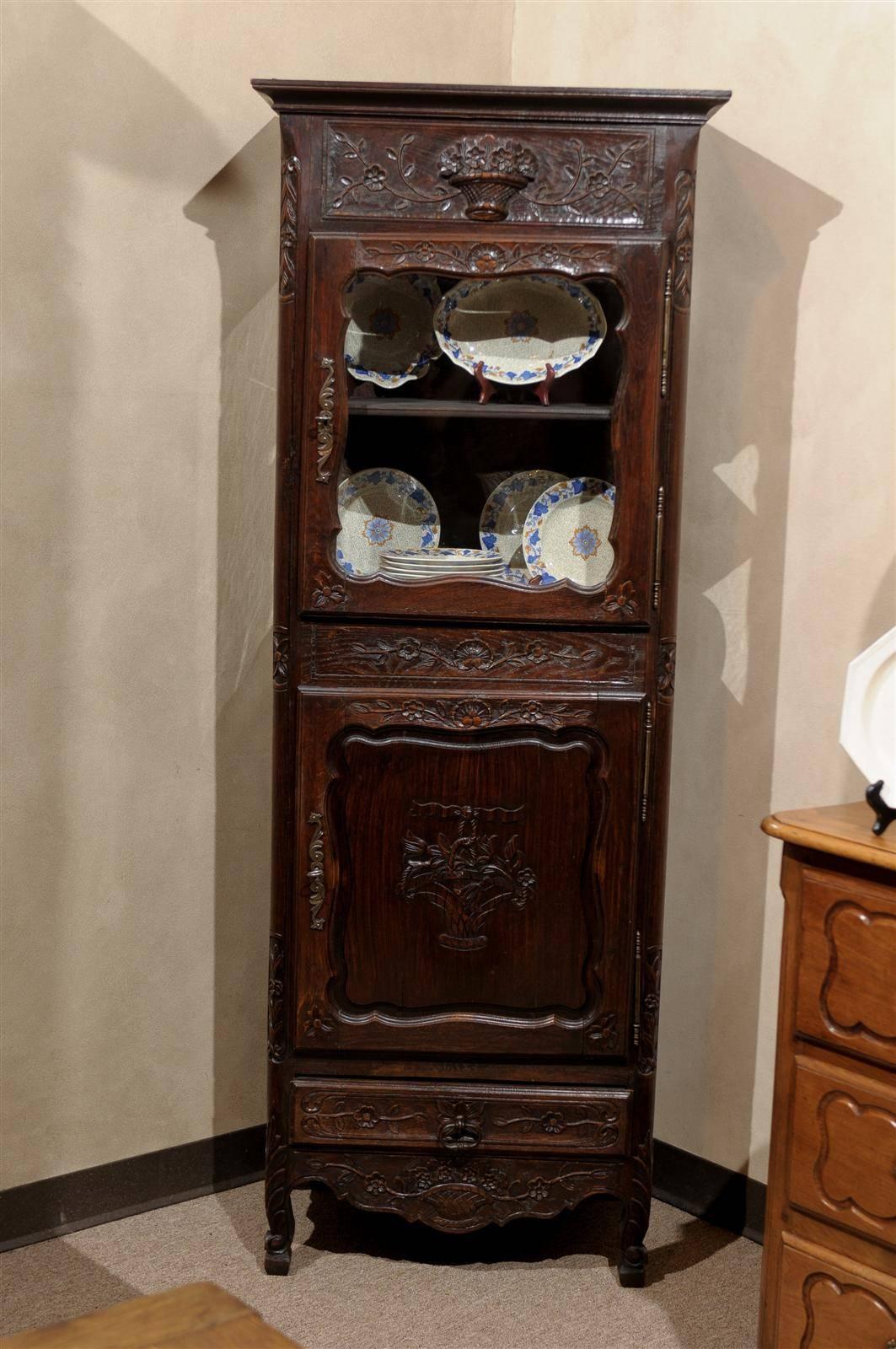 There are many wonderful options for using a piece of these proportions.  Often there is a small, narrow spot in a room that needs something of interest and this little piece with the very pretty carving and display space can help.  Other