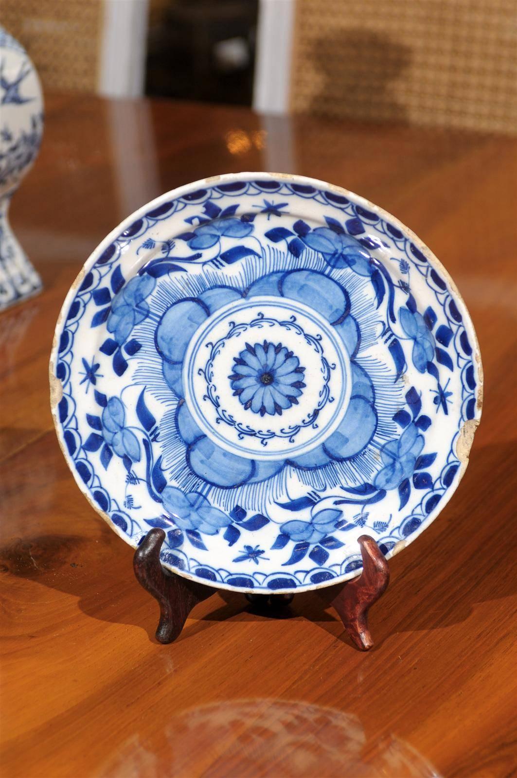 18th century blue Delft plate, circa 1750.
A mid-18th century Delft blue and white plate, with an unusual pattern with an overall flower theme.