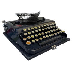 1930er Remington Tragbare Schreibmaschine mit gelben Tasten, funktionstüchtiger Zustand