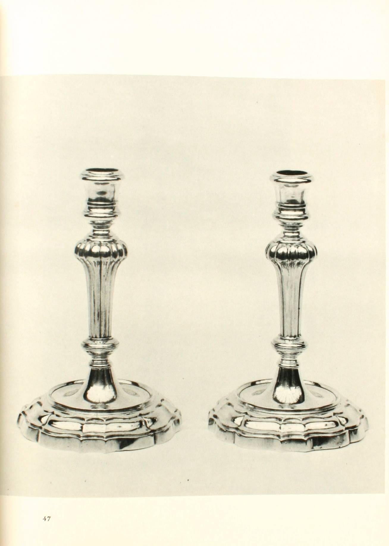 Candleholders in America, 1650-1900 by Joseph T. Butler. NY: Bonanza Books, 1967. First edition thus hardcover with dust jacket. 178 pp. 136 full-page photos of candlesticks, candelabra, chandeliers, sconces, candle stands, lanterns, and candle
