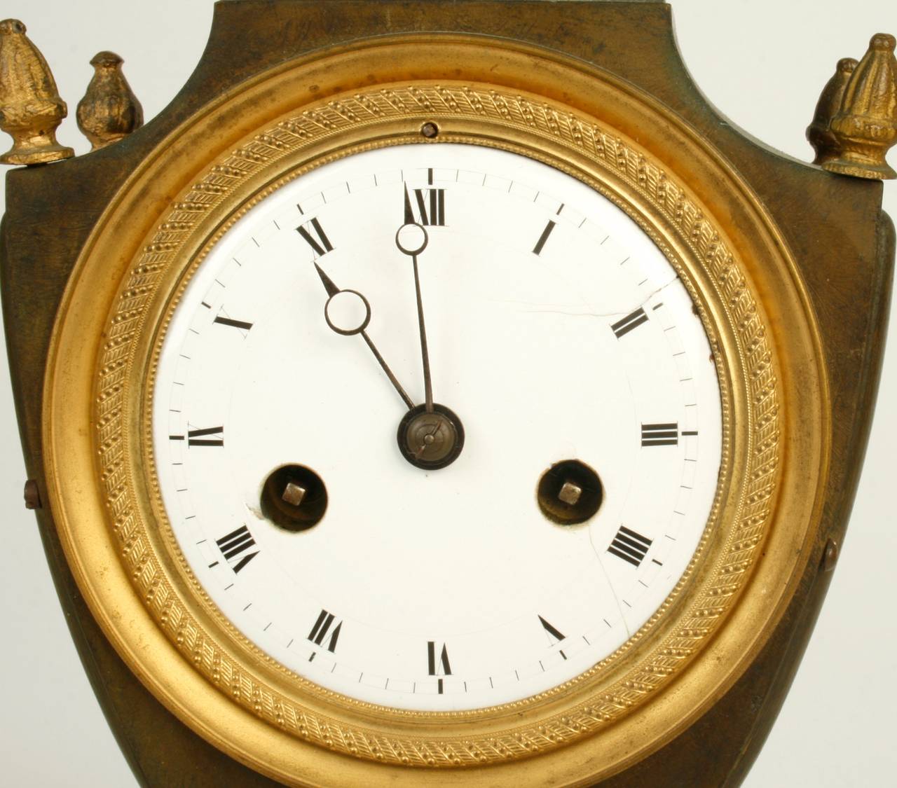 Gilt Ormolu and Patinated Bronze French Directoire Striking Clock, c1790 For Sale