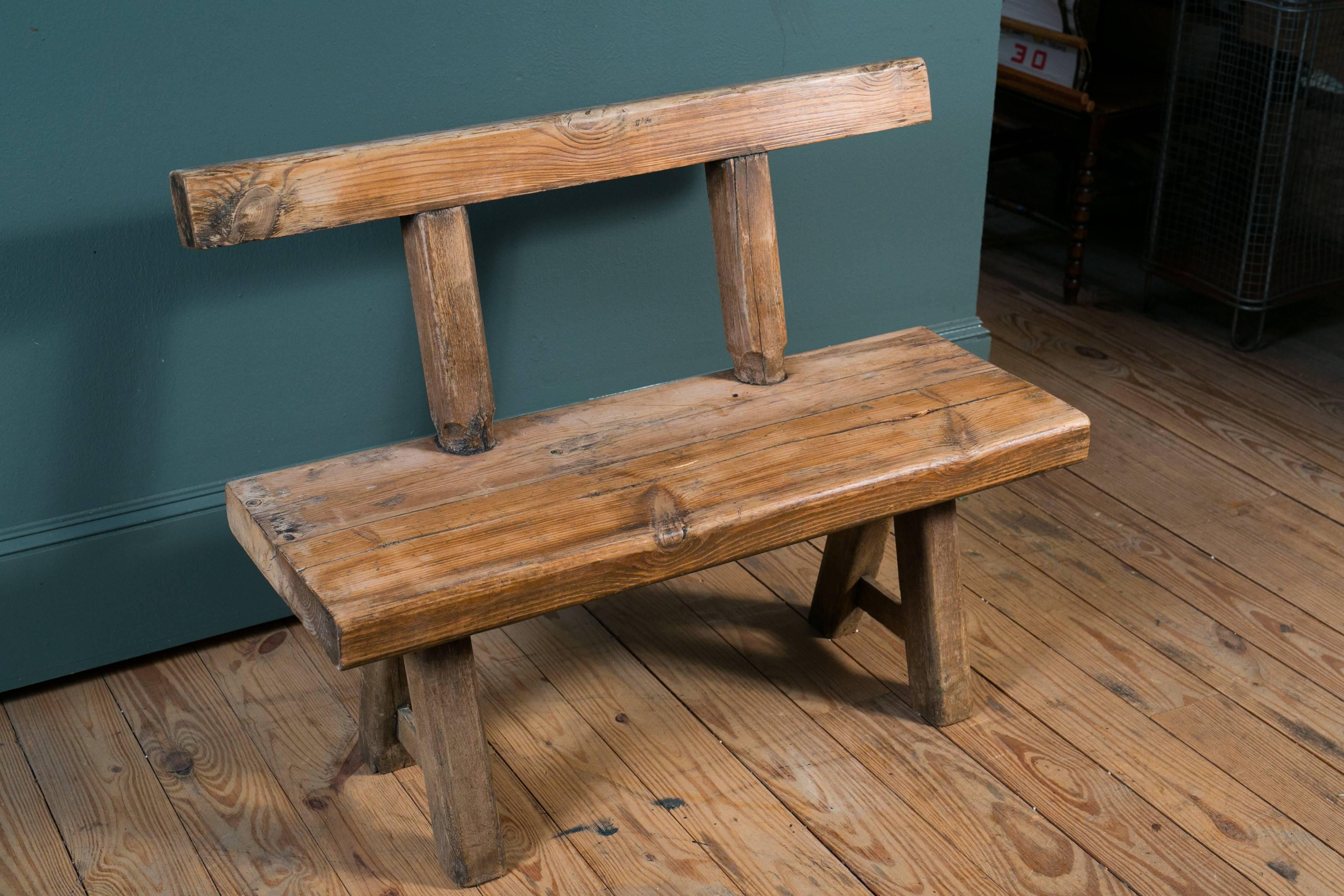 This bench is handmade and came from a beer garden near the Belgian/German border, circa 1920. Massive oak construction with iron brackets. Sturdy and comfortable. Various sizes available. Price and measurement listed is for the one in the photos.