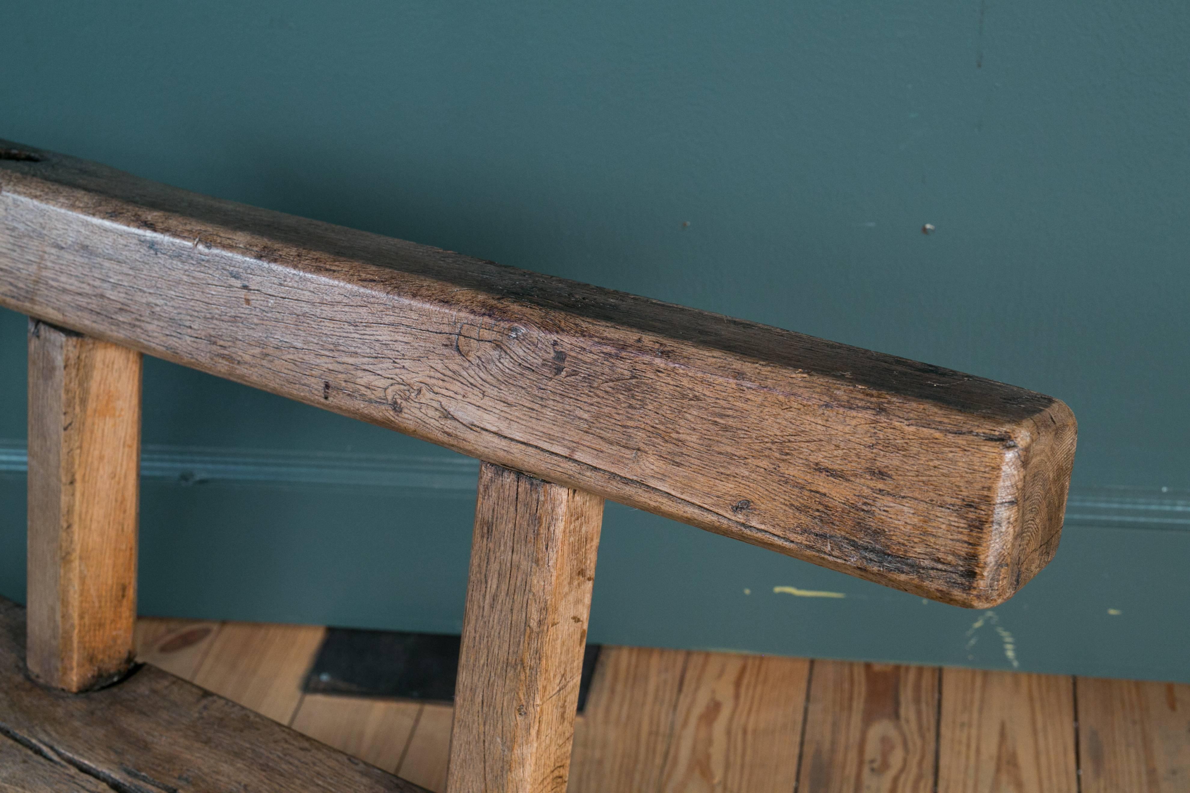 rustic wood bench with back