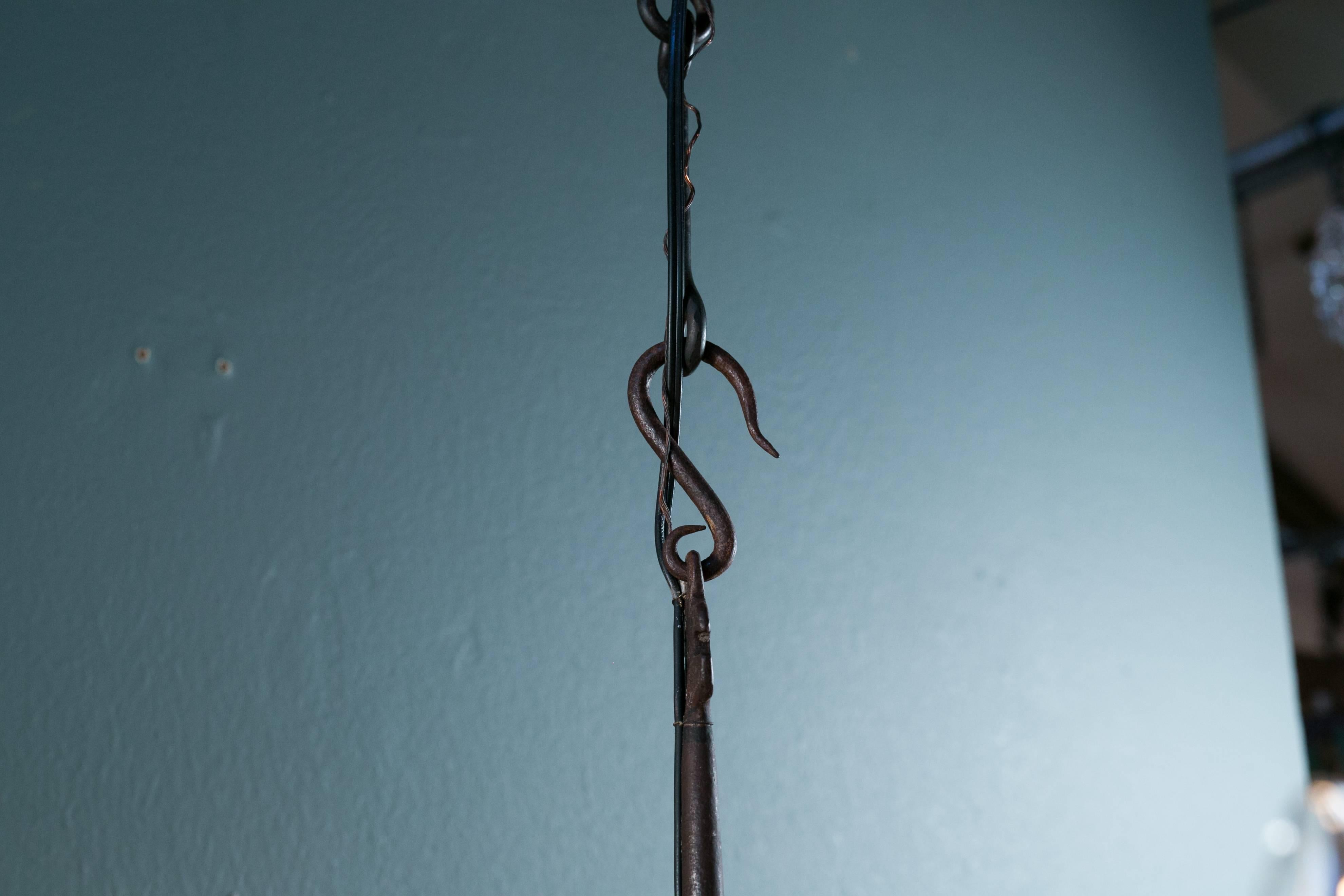 Early 20th Century Hand-Forged French Iron Chandelier with Three Arms and Nine Lights, circa 1920