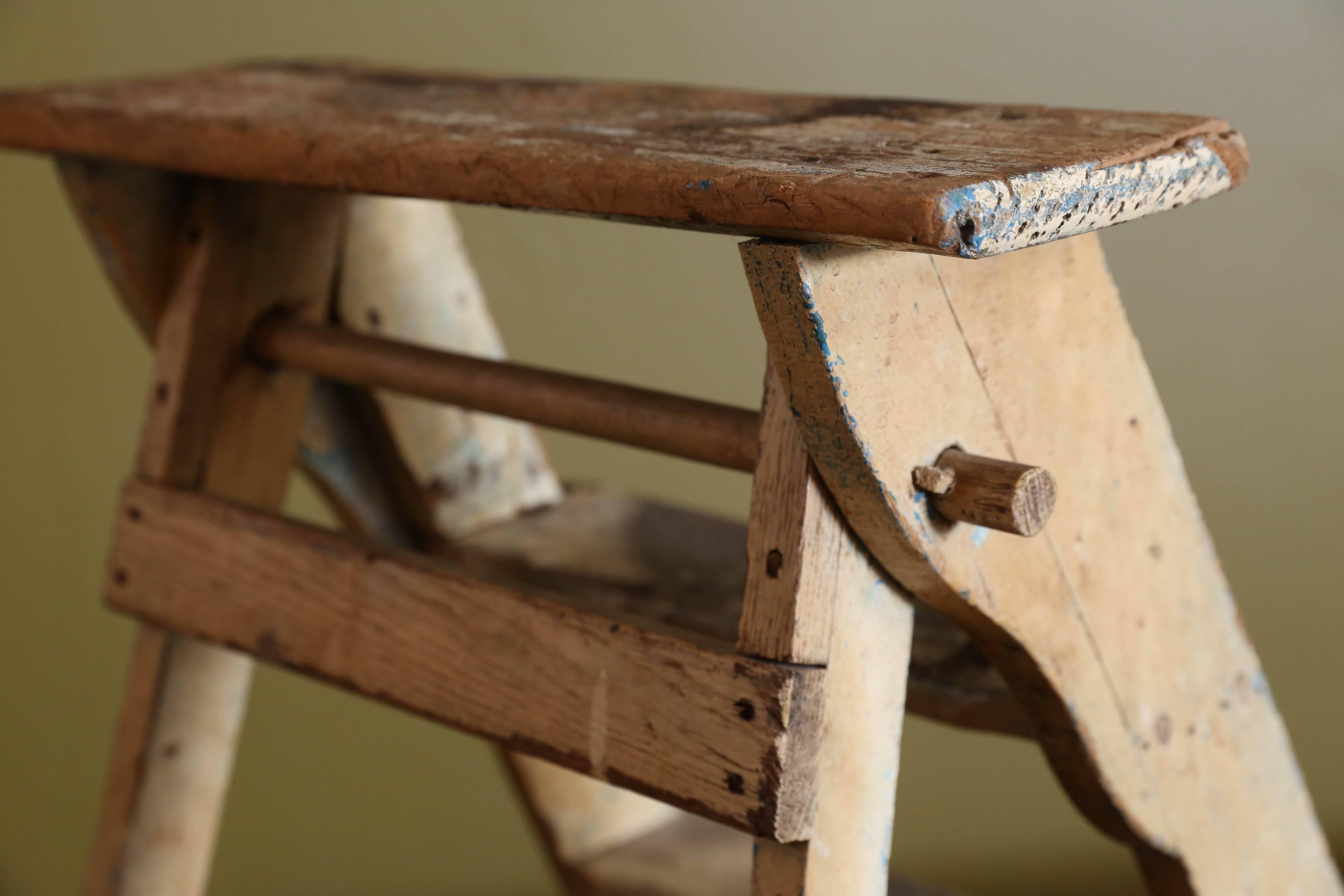 Three step folding ladder from Belgium, circa 1920. All original with original paint.