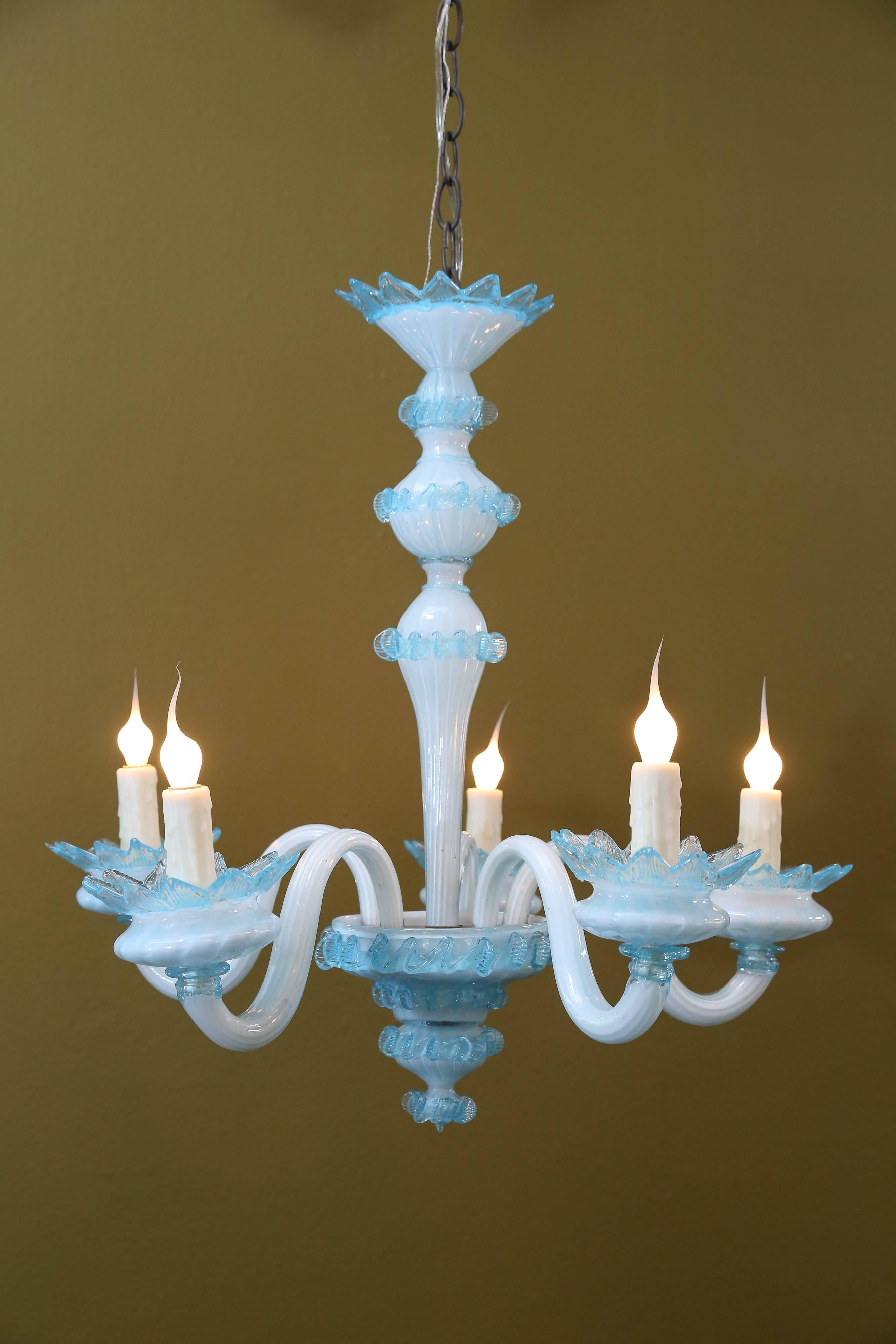 Five-arm blown glass chandelier from Murano, Italy, circa 1950s. Beautiful and unusual blue color. Newly wired with all UL listed parts and five candelabra sockets. Comes with chain and canopy.