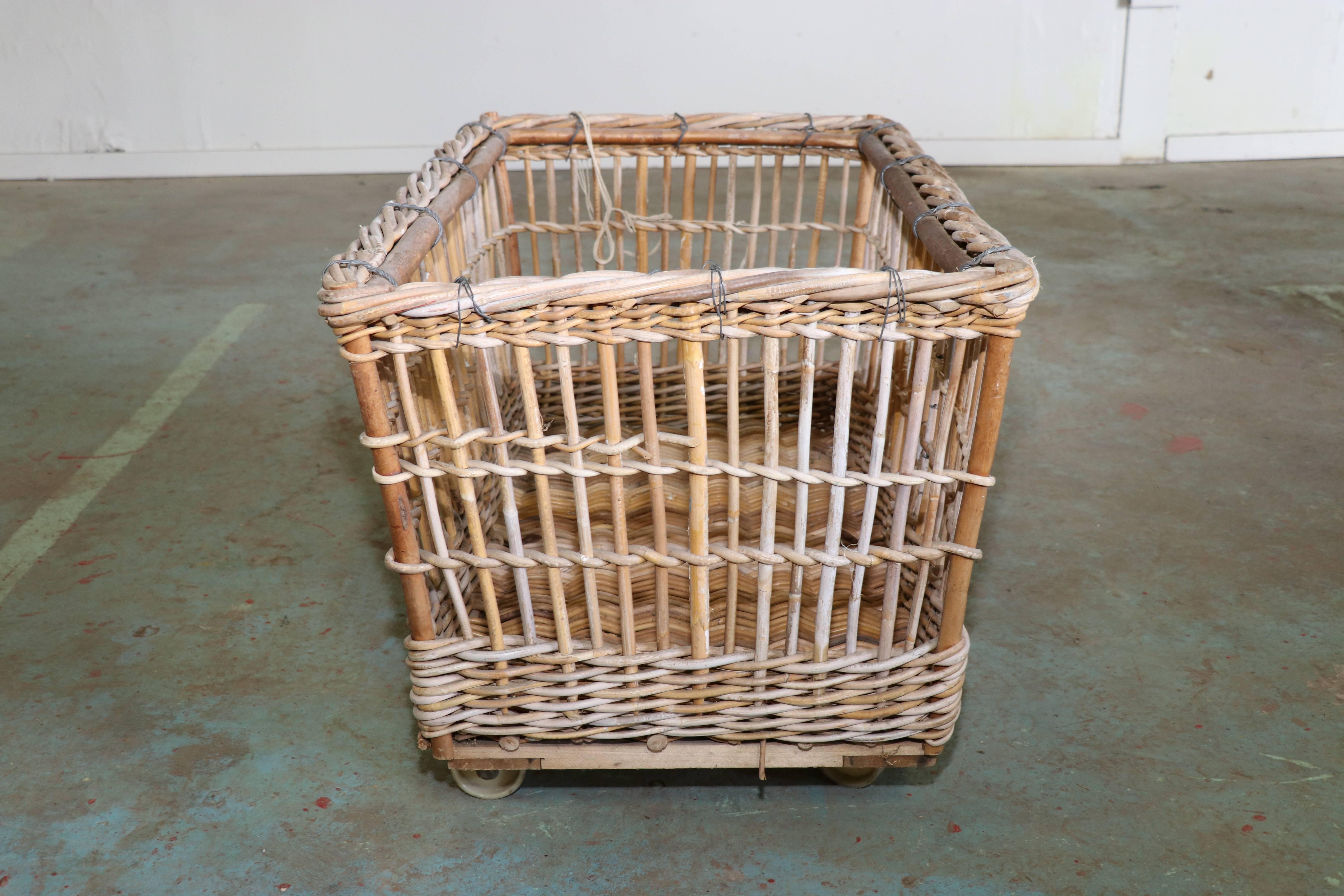 This large-scale wicker cart was used in a Belgian linen factory in the 1920s. The cart is on four wheels. Two carts available, which vary slightly. Price is for one cart.