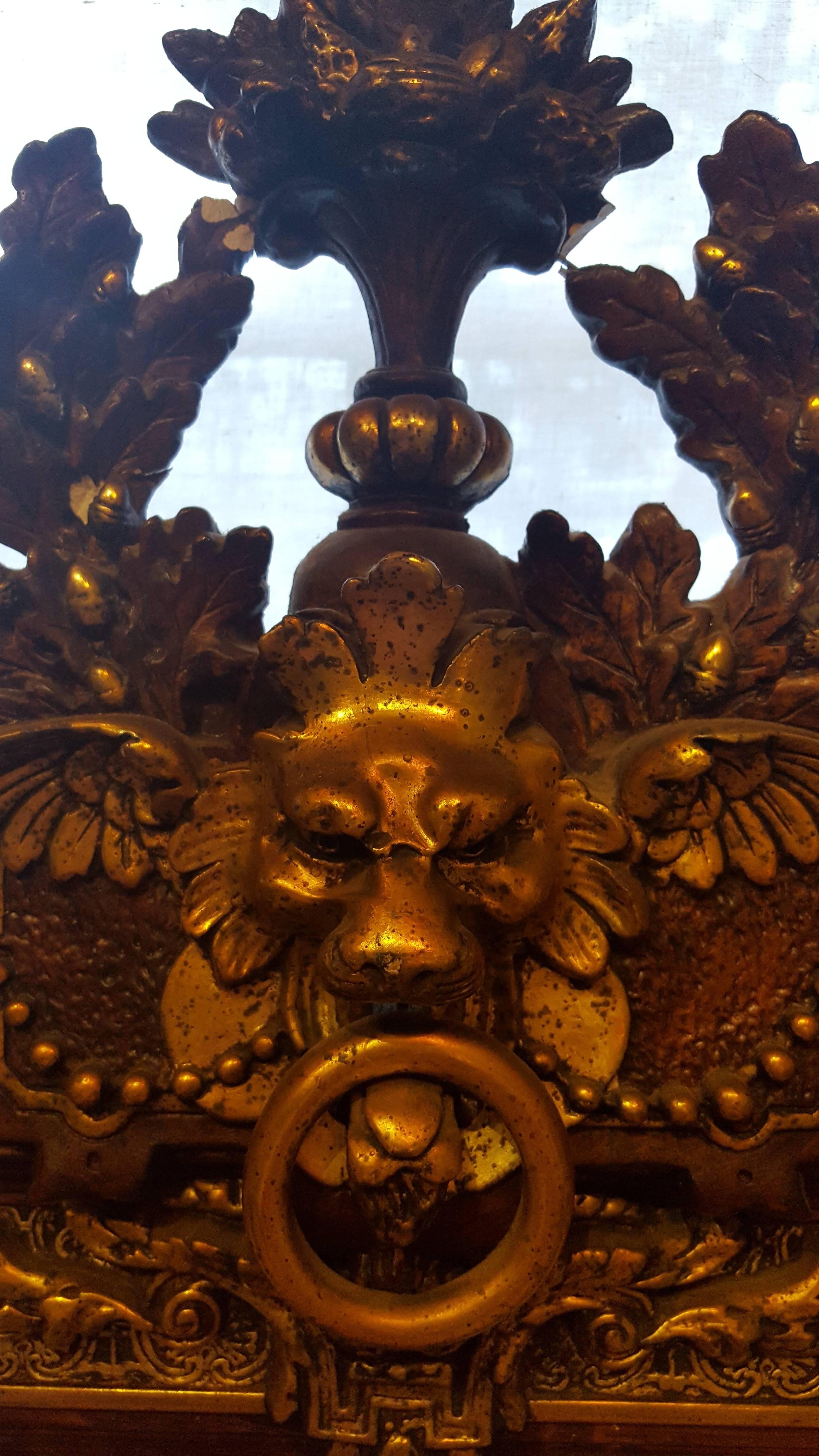 Early 20th Century Large Water Gilt  Austrian Rococo Style Mirror with Winged Lion, circa 1900 For Sale