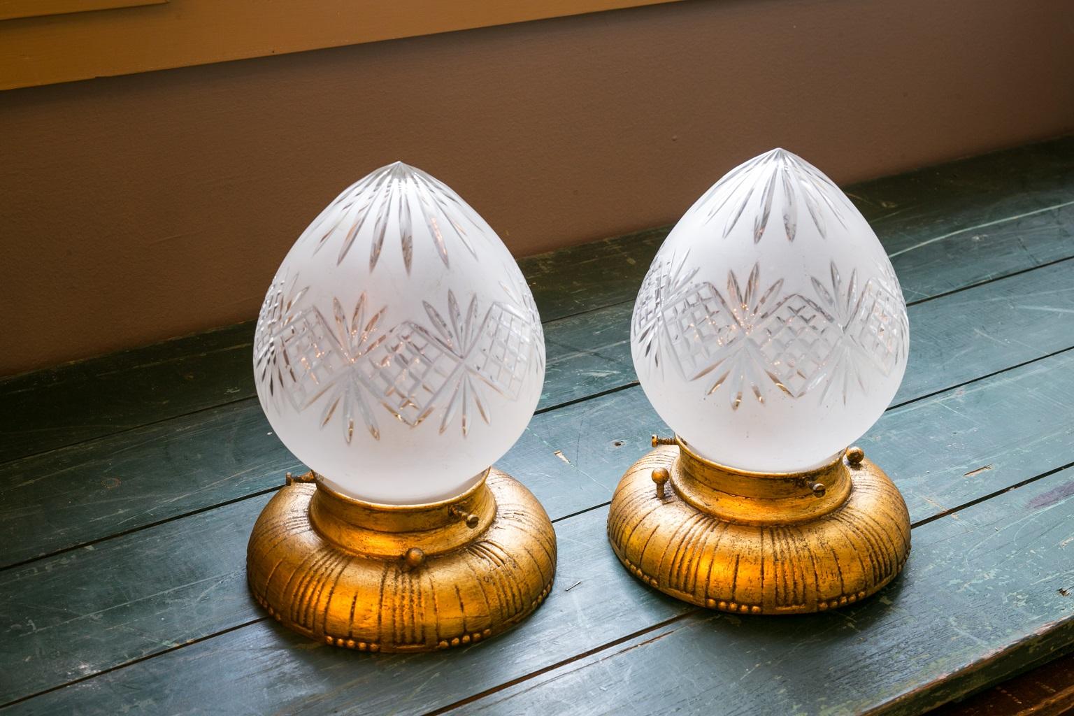 Pair of cut crystal lights (flush mount), circa 1900. Newly wired for use within the USA. The cur glass globes are antique and simple and beautiful.  The lights could also be mounted on the wall as sconces.