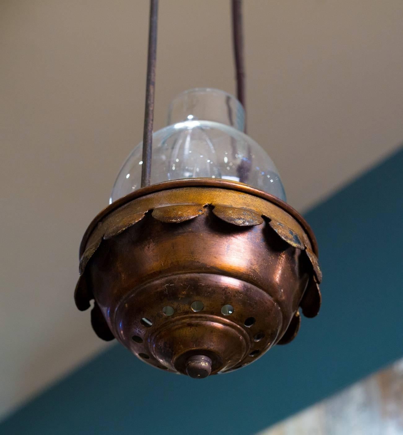 Charming, petite vintage lantern with copper base, iron handle and vintage Belgian glass hurricane. One Edison socket, newly wired in the US with all UL listed parts. Perforated base with scalloped edge around the middle. From France, circa 1920.