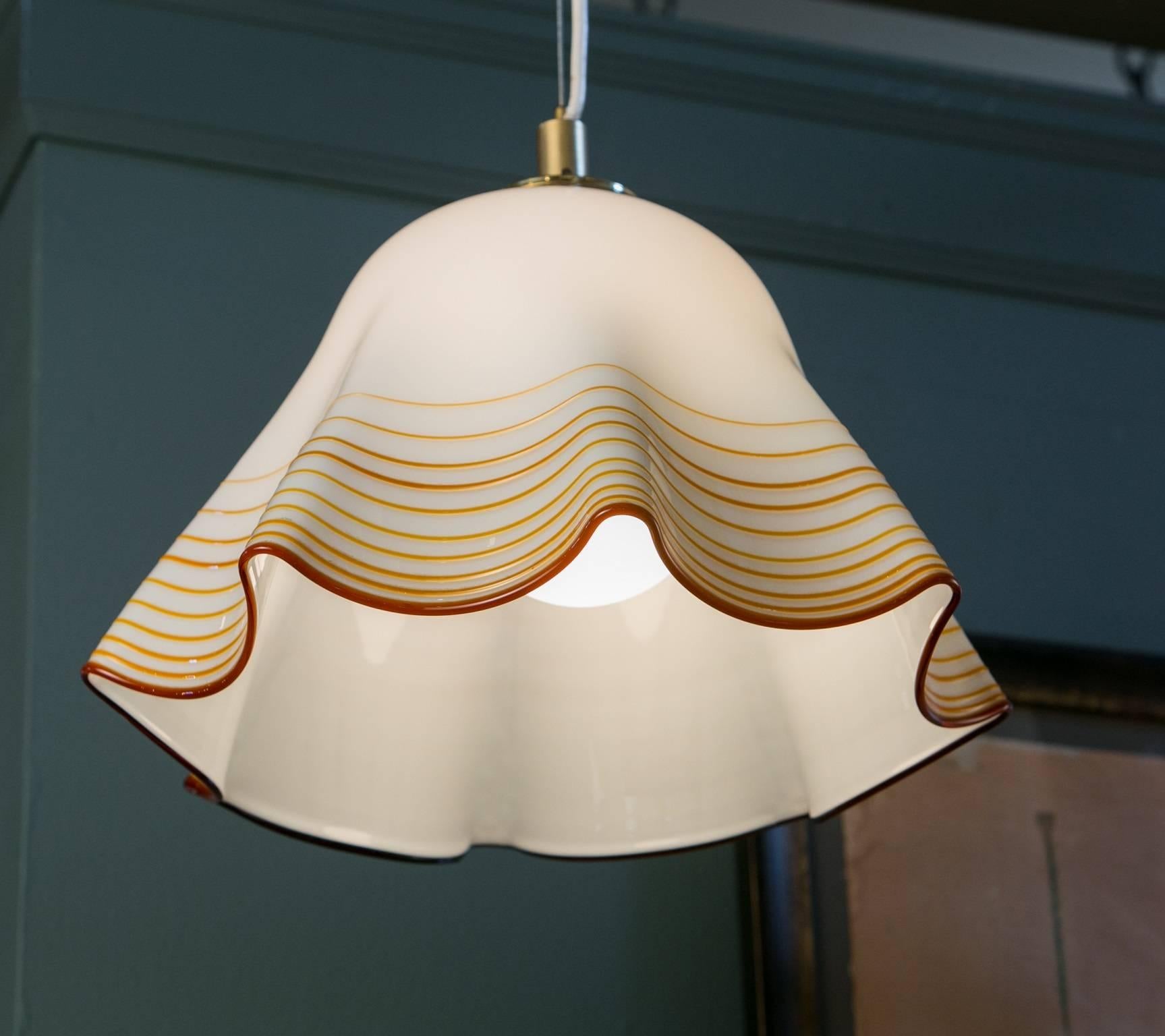 Handblown Murano glass pendant re-wired for the USA with a single Edison socket using UL-approved parts. Elegant white and caramel coloring with a fenicio technique, unattributed to Venini. Beautiful craftsmanship. Mid-Century Modern handkerchief