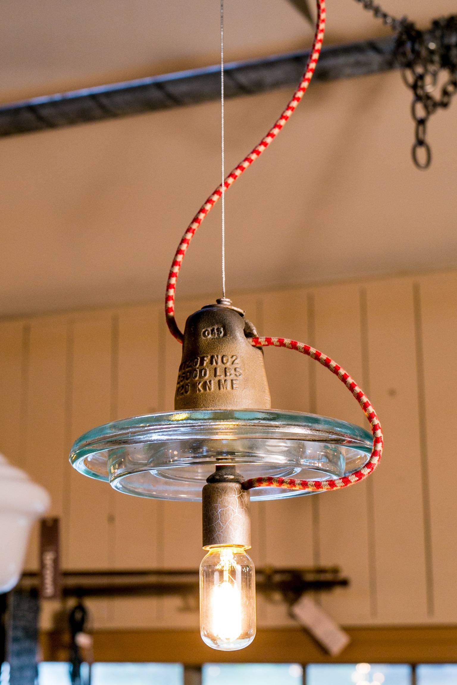 Vintage, Industrial glass disc pendants from a Belgian factory with new colored cords. Heavy glass with a steel cable and round plug end. Newly wired in the US with UL approved parts and porcelain Edison socket. Multiples available, price is for one