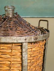 Antique Demi-John in Original Handwoven Rattan and Zinc Basket