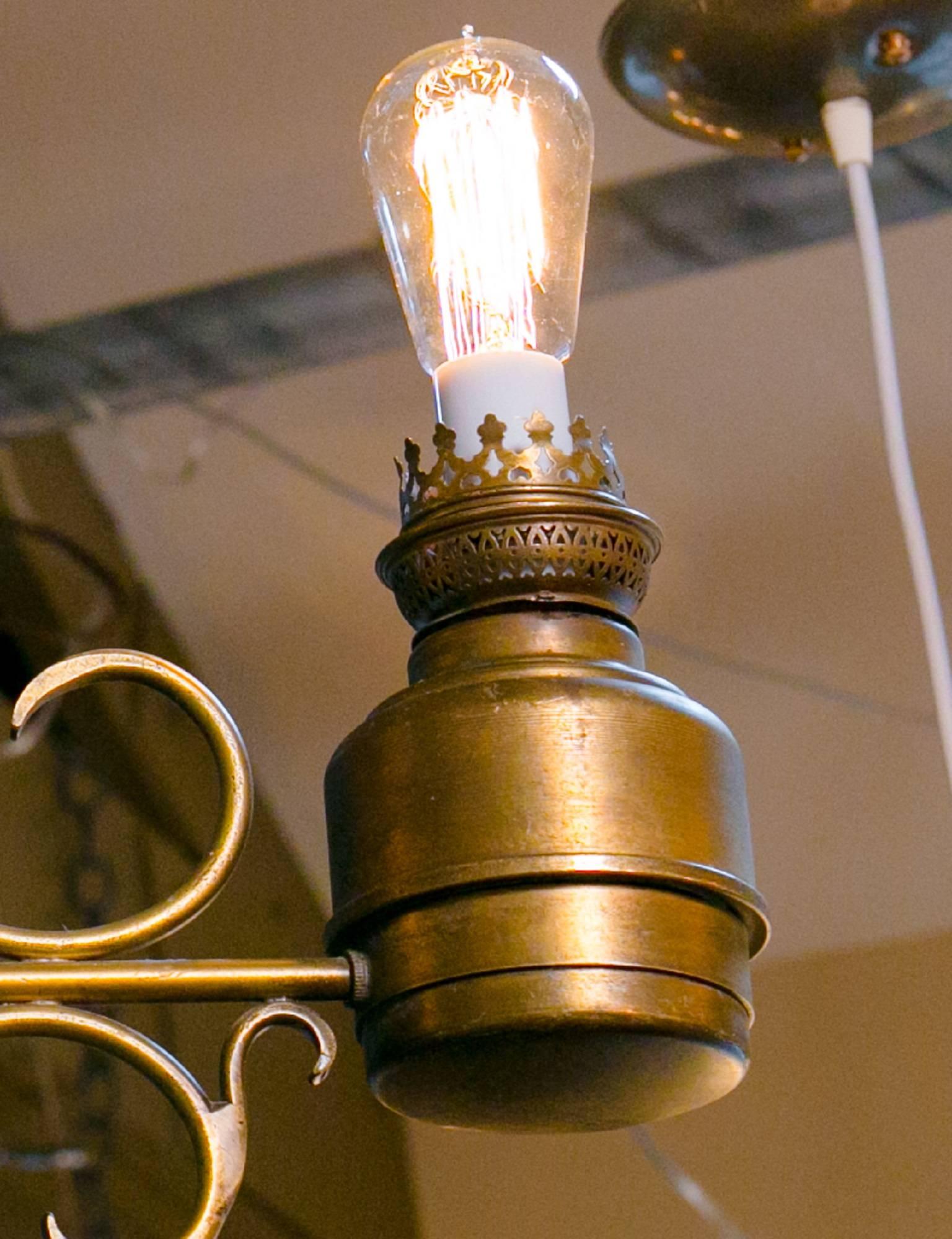 Brass light from France, circa 1900s. Newly rewired in the USA with all UL approved parts and two Edison sockets. Shown with reproduction Edison filament bulbs, not included. Comes with a matching chain and canopy.
Would be great over a kitchen