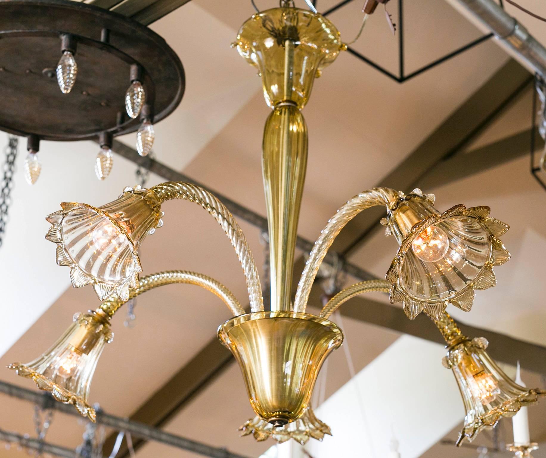 Five-arm, handblown glass chandelier from Murano, Italy, circa 1930. Beautiful olive-gold color and unusual shape. Newly rewired in the USA with all UL listed parts and five downward-facing Edison sockets. Comes with chain and canopy.