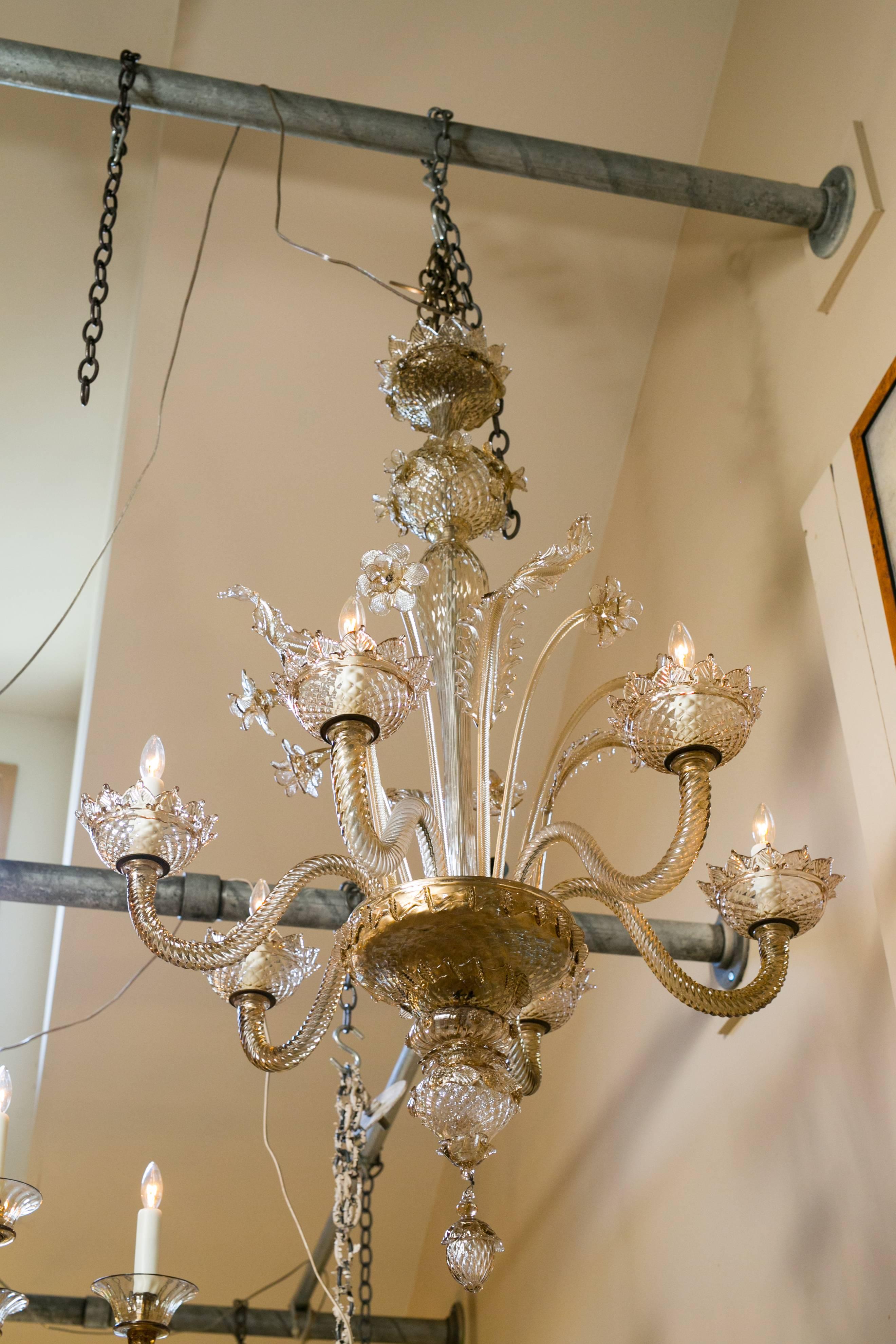 Large handblown Murano glass chandelier with all original parts. Beautiful champagne-beige color, newly rewired in the USA with all UL approved parts and six candelabra sockets. Comes with chain and canopy.