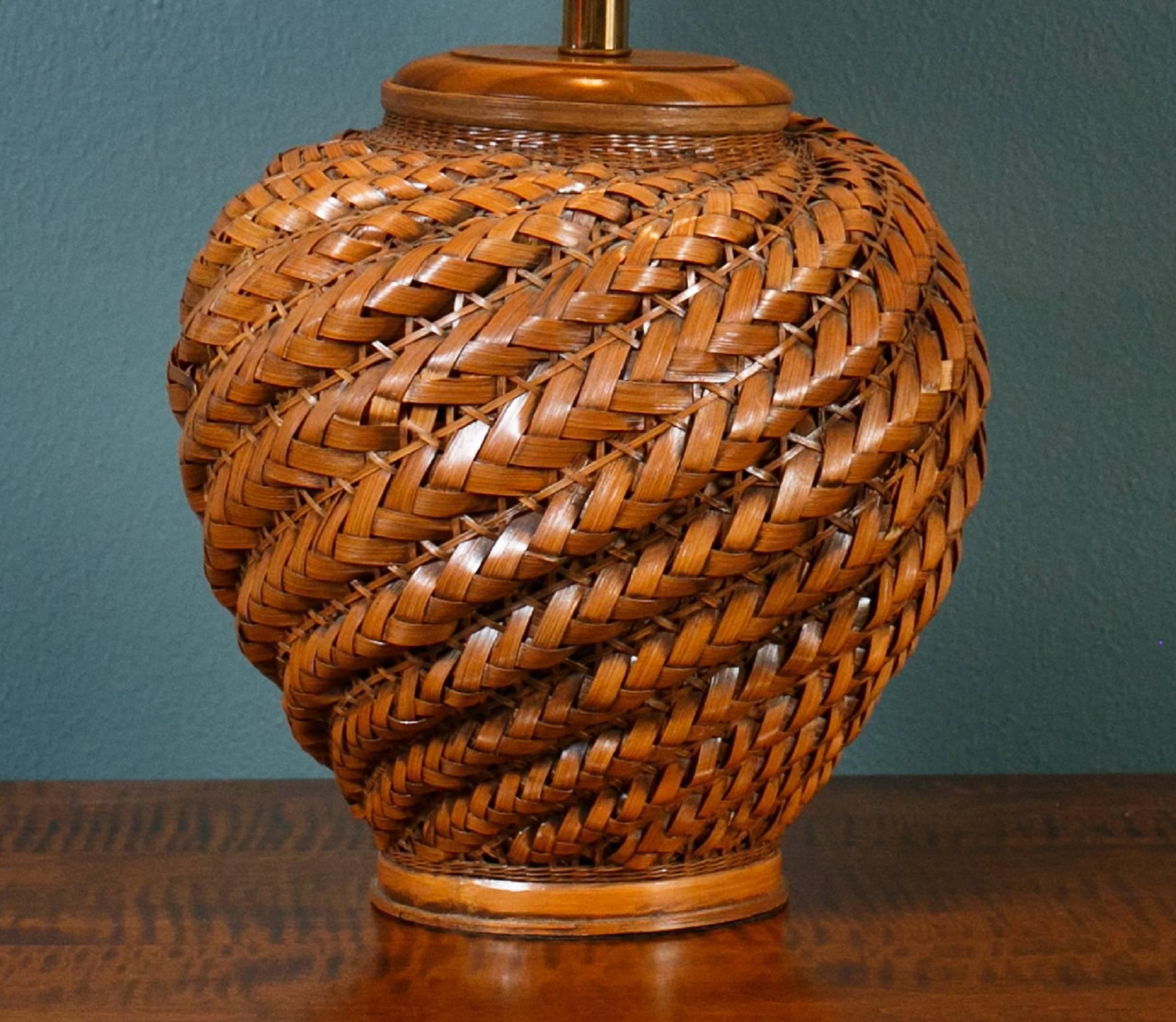 Unusual plaited wicker table lamp with beige cotton shade. Beautiful color and proportion. Measurement is with shade on.