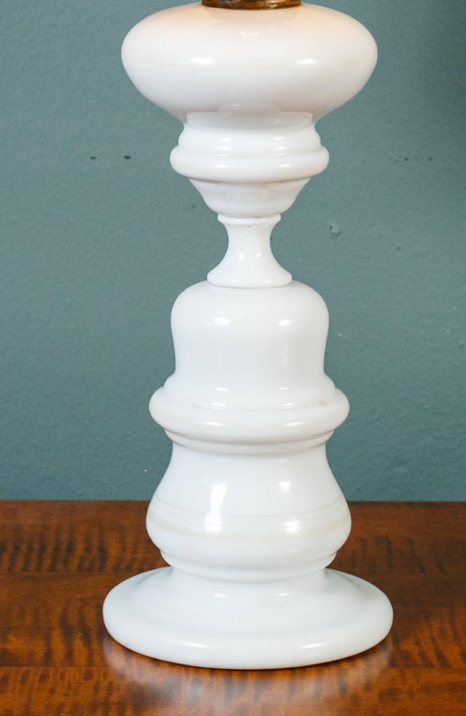 Vintage milk glass table lamp with off-white shade. Subtle ivory stripes painted on the banding of the body. Newly rewired with all UL listed parts and braided ivory fabric cord. Measurement listed is with shade on. Lamp itself measures 6.25 inches