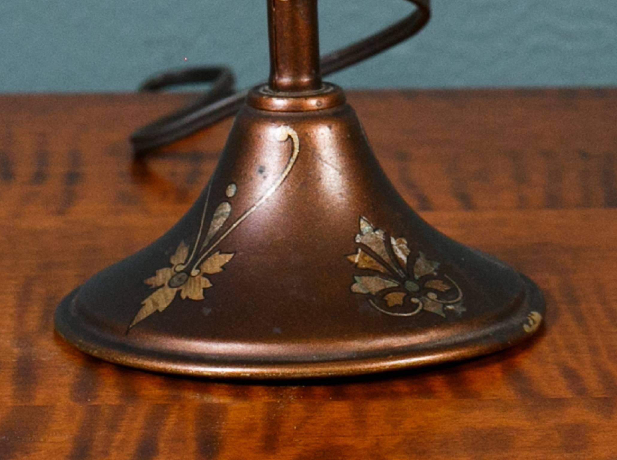 Interesting vintage lamp, by Greist Mfg of New Haven, CT. The Greist Juniorlite, Pat. 1914. Convertible with a joint, or knuckle below electric socket. May be used on table or desk top, or hung on wall. Brass over cast iron base, with a spring