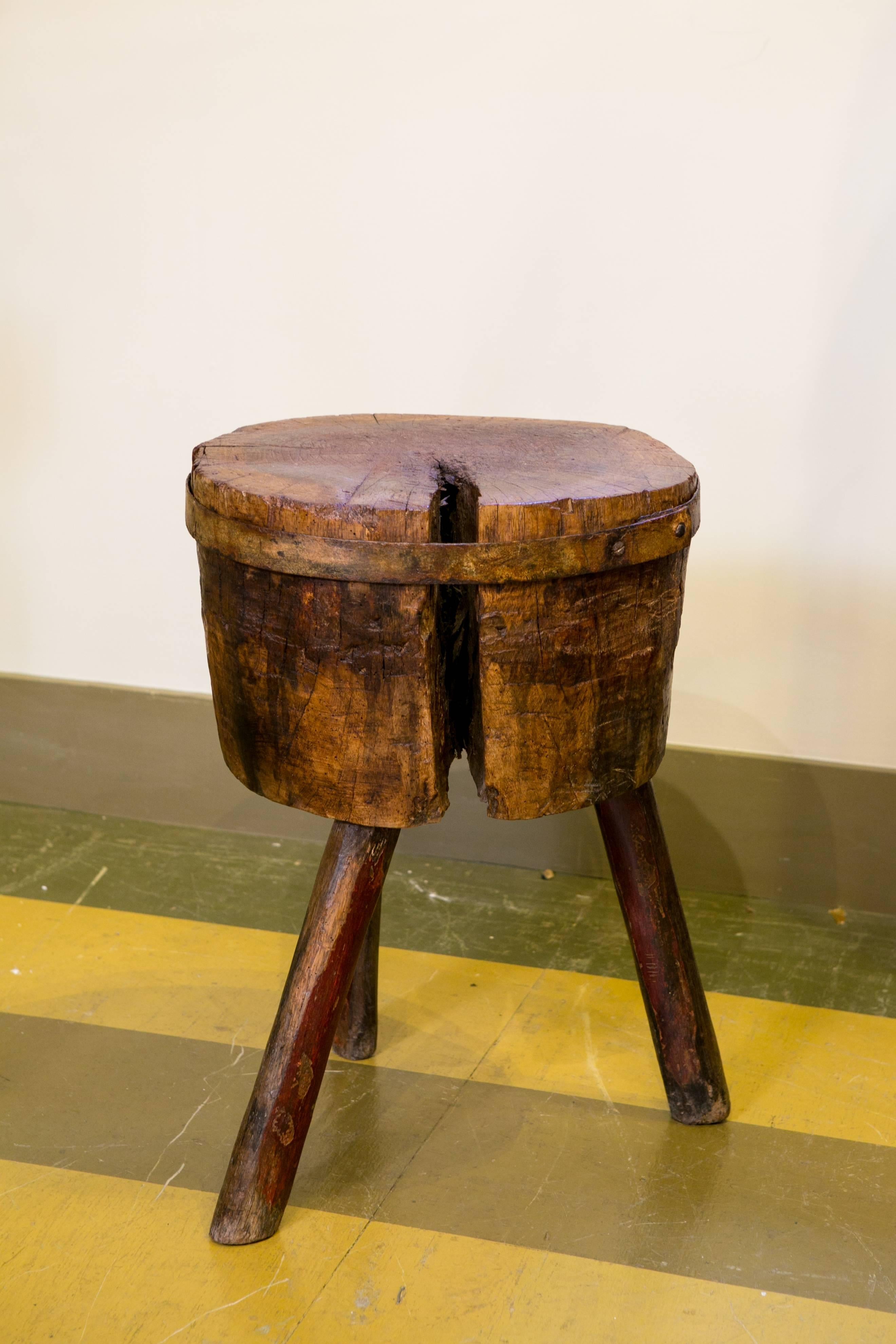 Charming butcher block with three splay legs and iron band at top. From France, circa 1900. All original, handcrafted. Would make a great side table. Diameter listed is for the leg base. Top measures approximately 18.5 inches wide by 16 inches deep.