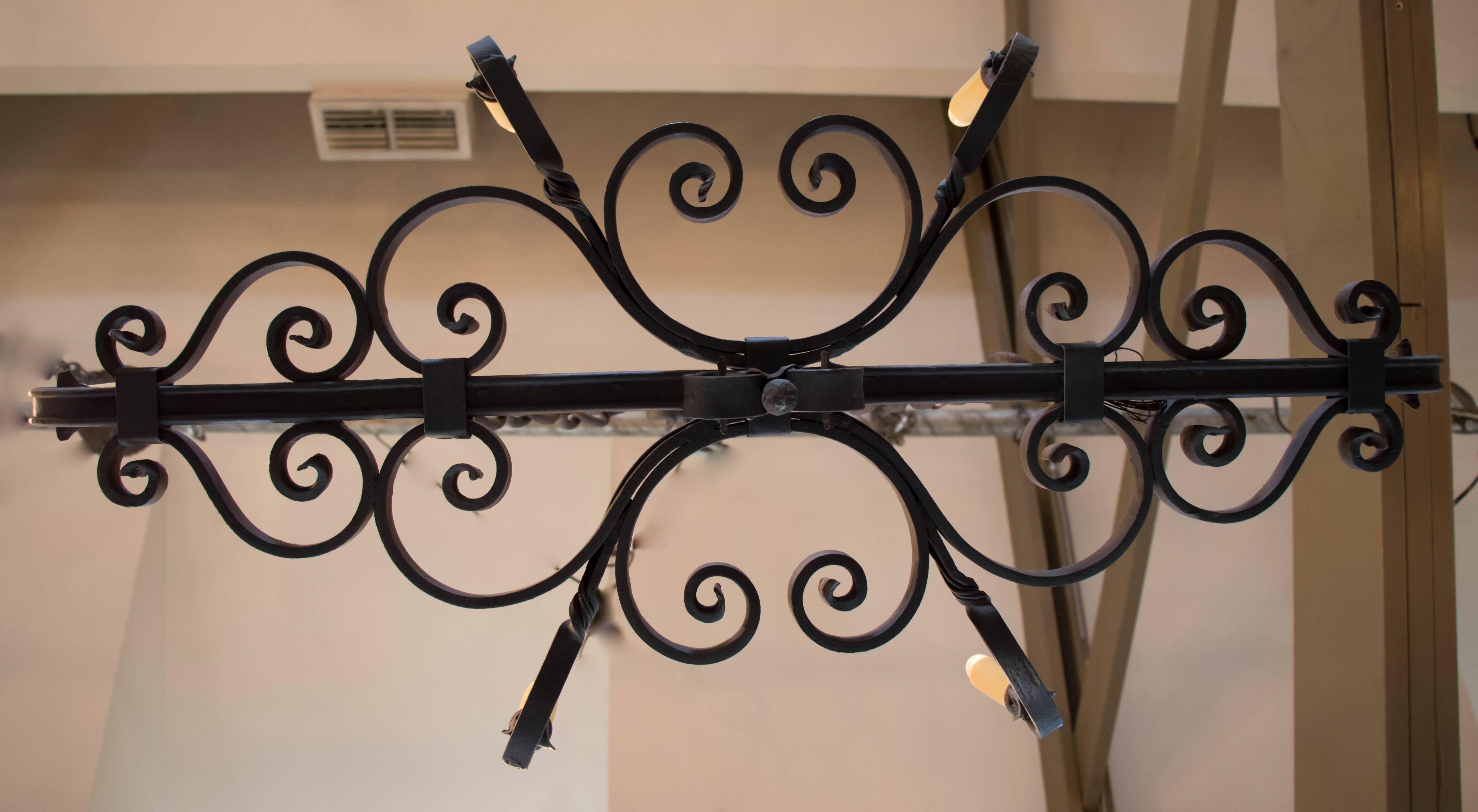 Rustic Hand-Forged, Spanish Linear Iron Chandelier , circa 1930