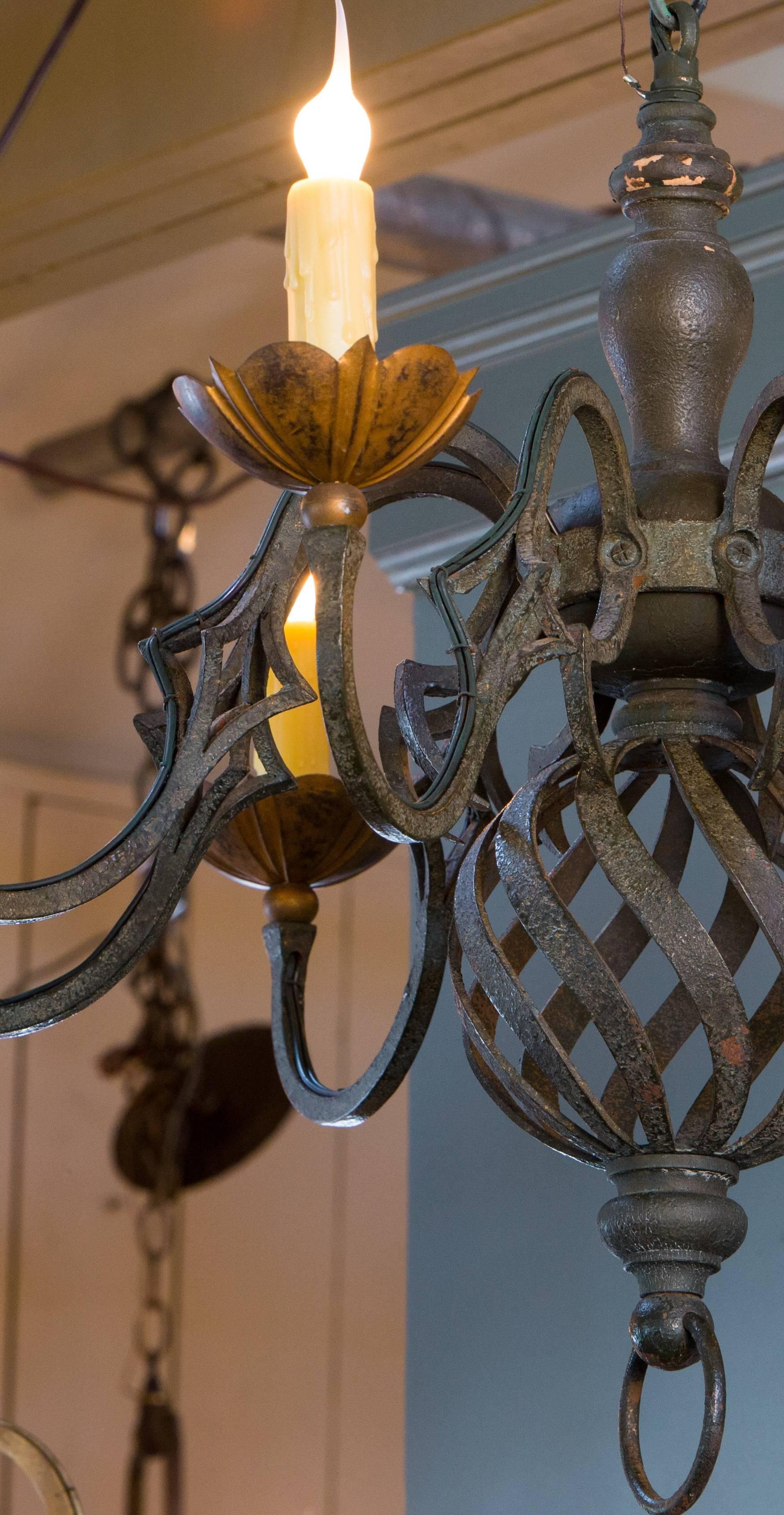 French Provincial Black and Gold Iron Chandelier with Eight Arms from France, circa 1920