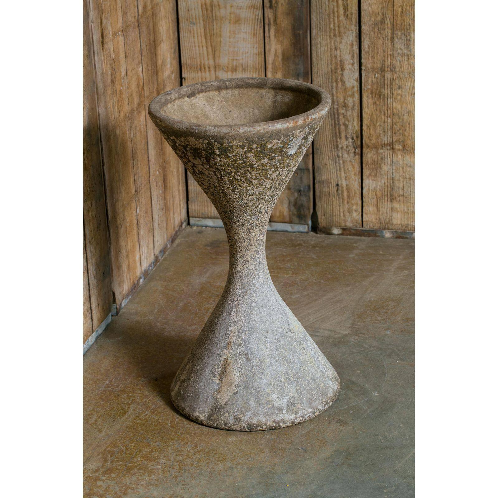 Wonderful vintage Willy Guhl spindle or diablo style planter from Swiss company Eternit Ag, circa 1950s. Dappled dark grey coloring, constructed of fiber cement. Great Mid-Century Modern hourglass geometric design. Stamped with serial number inside