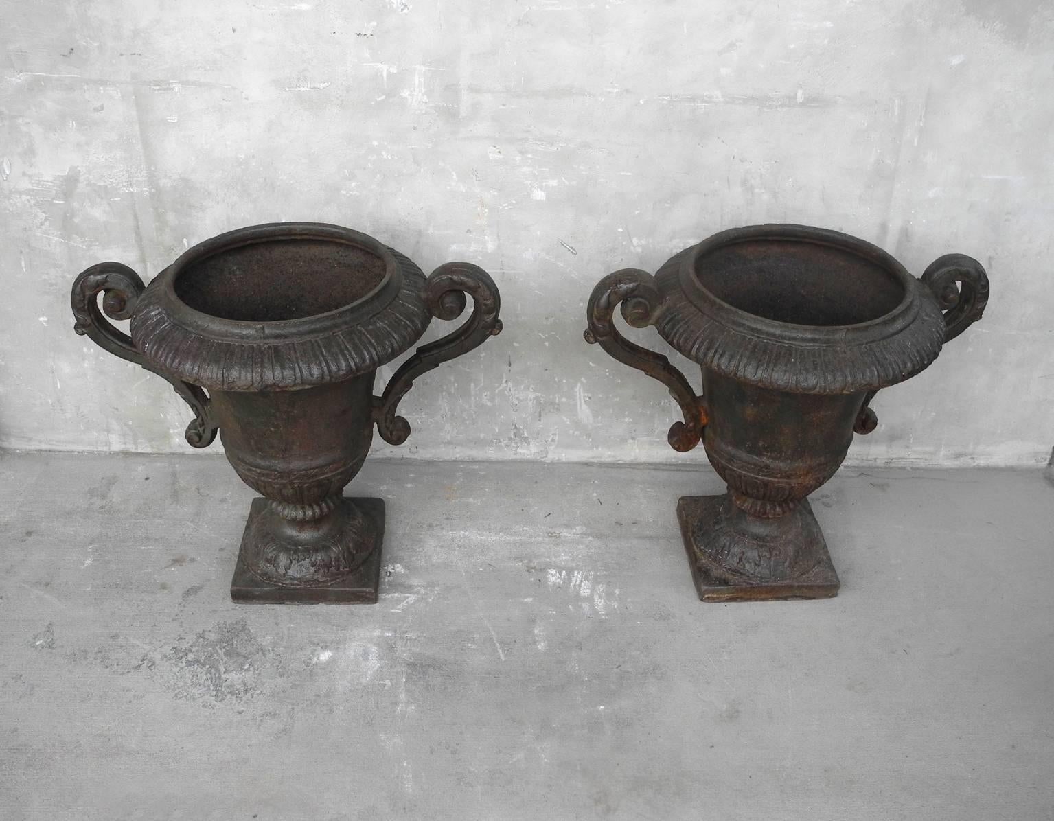 French Pair of Antique Iron Urns with Detailing & Carved Arms from 19th Century France For Sale