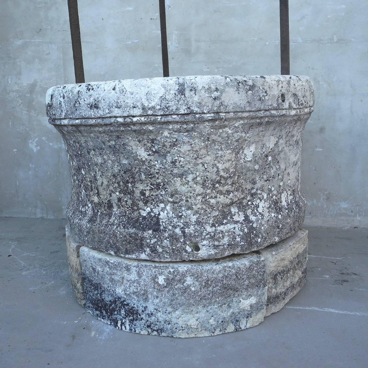 Antique 17th circa well from a garden in uzes, a town in the Languedoc-Roussillon Region of France.