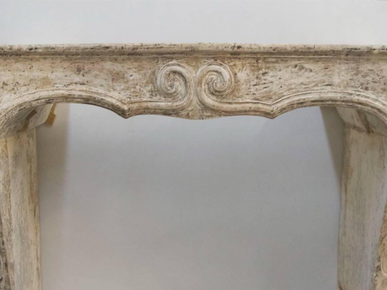 This is a lovely antique 18th century stone mantel from a 