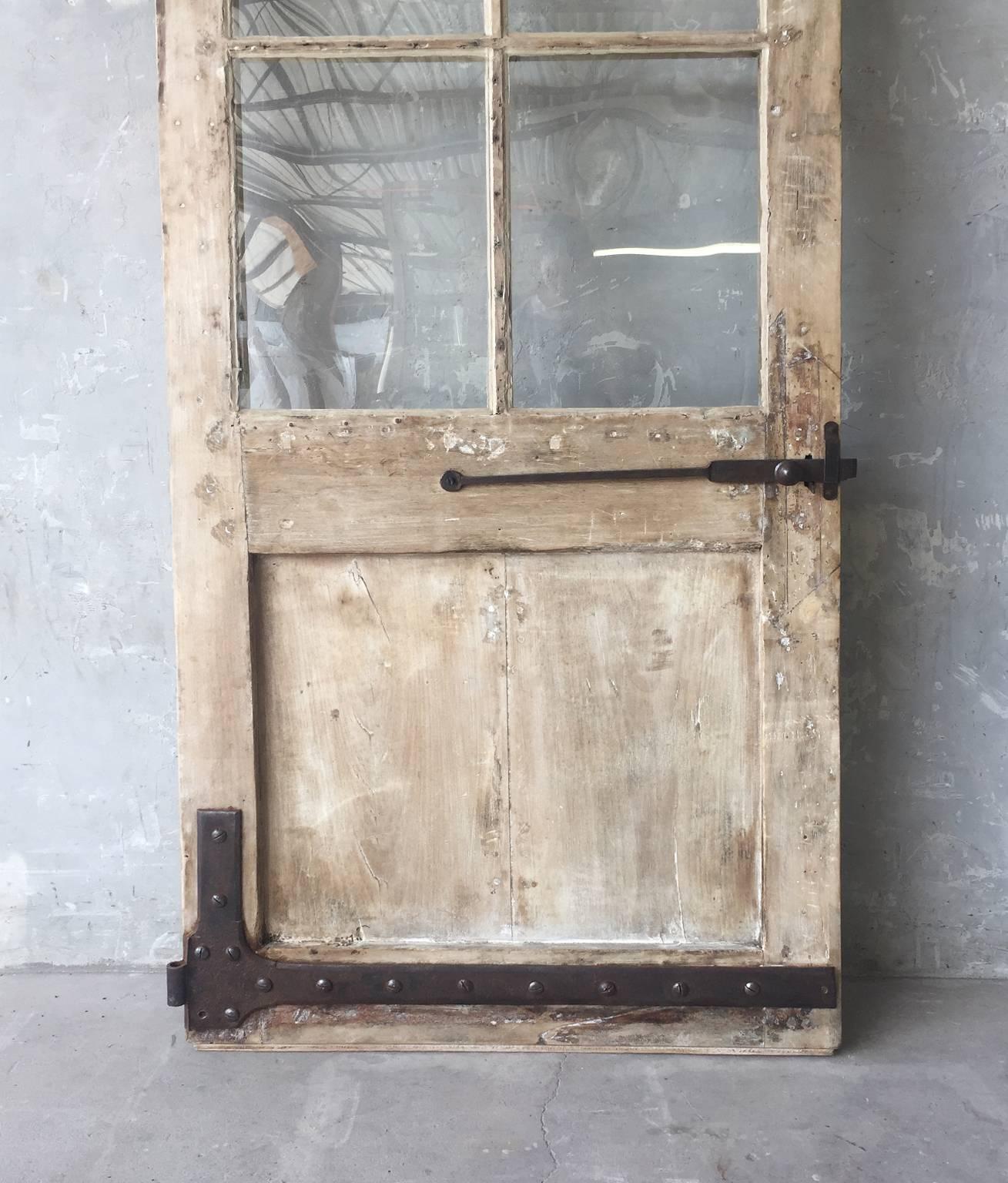 18th Century and Earlier Antique French Walnut Door with Glass and Original Handle and Carved Bottom