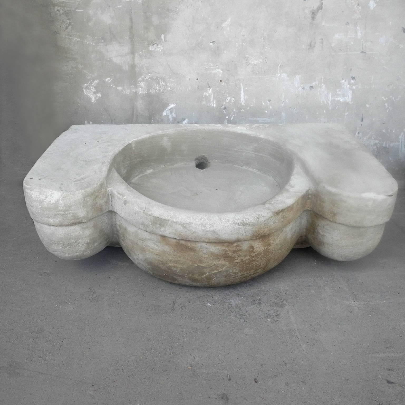 This is a fabulously large 17th century stone sink or evier from the Chateau de Saint Christol in the French Languedoc Village of Mas Christol. This antique sink is wonderful as the centerpiece to any bathroom. With its deep basin and large side