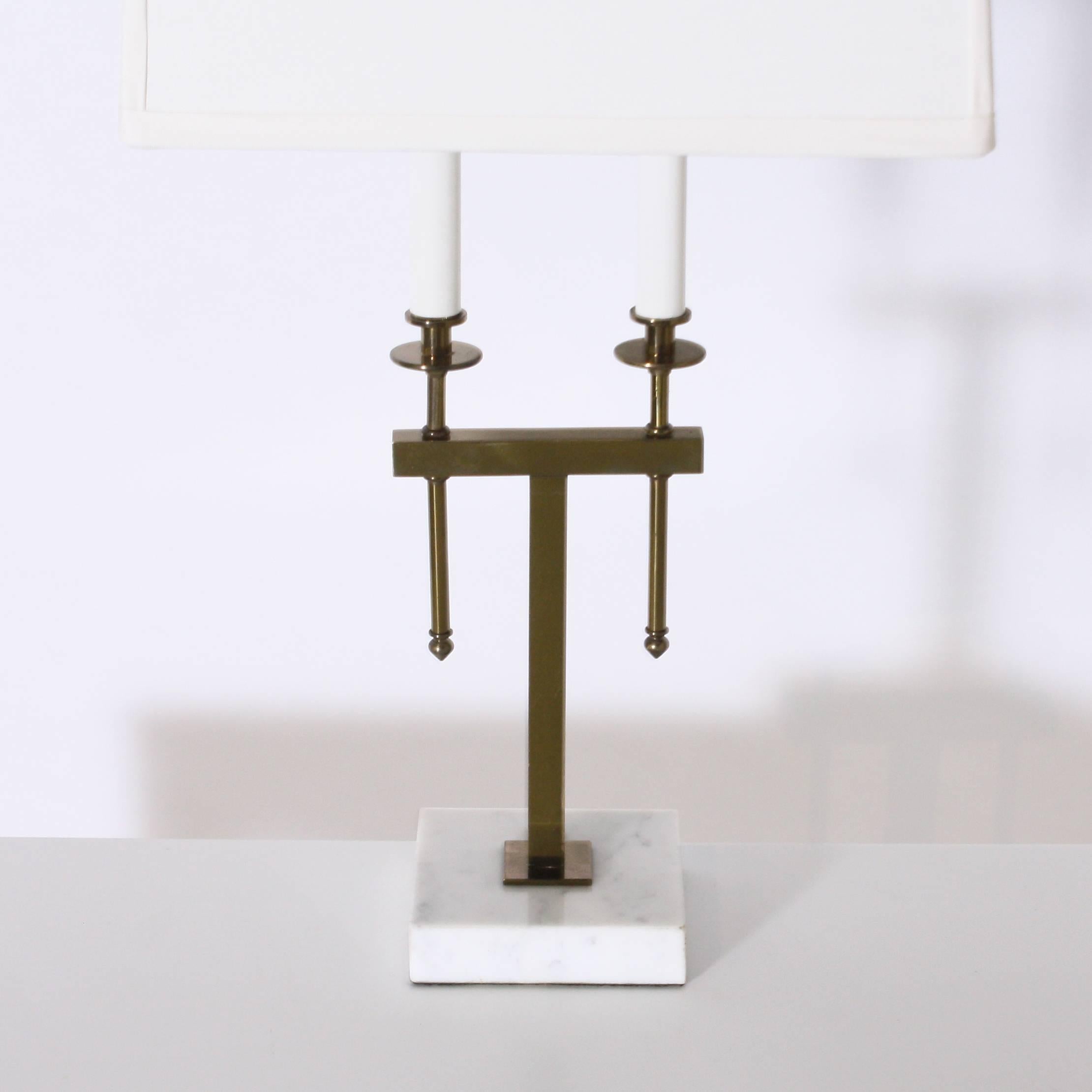 Brass and marble Stiffel lamp in the style of Tommi Parzinger, circa 1950.
   