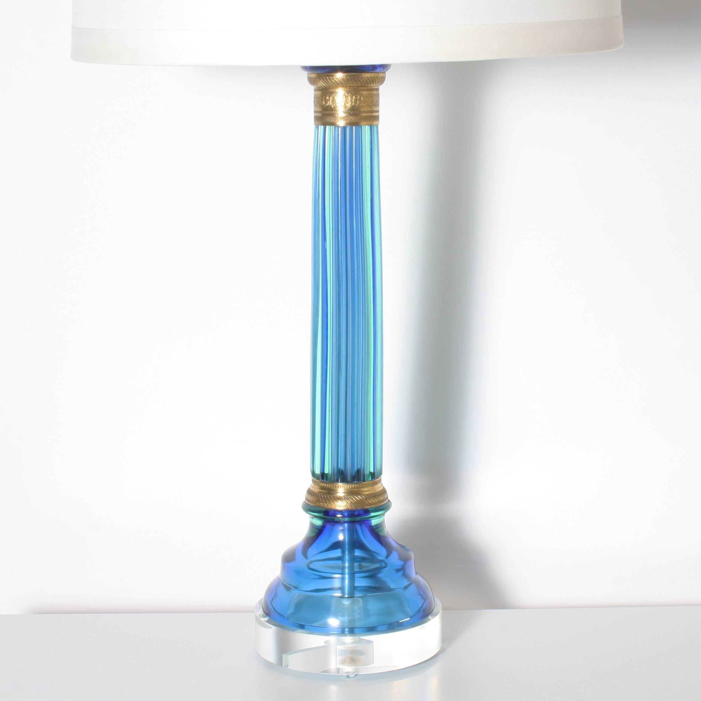 Pair of blue Marbro Murano lamps by Seguso. Off-white pongee shade. 3 way socket, 50/100/150 watt. Brass hardware. Lucite base. Crystal ball finial. Gold twisted cording.