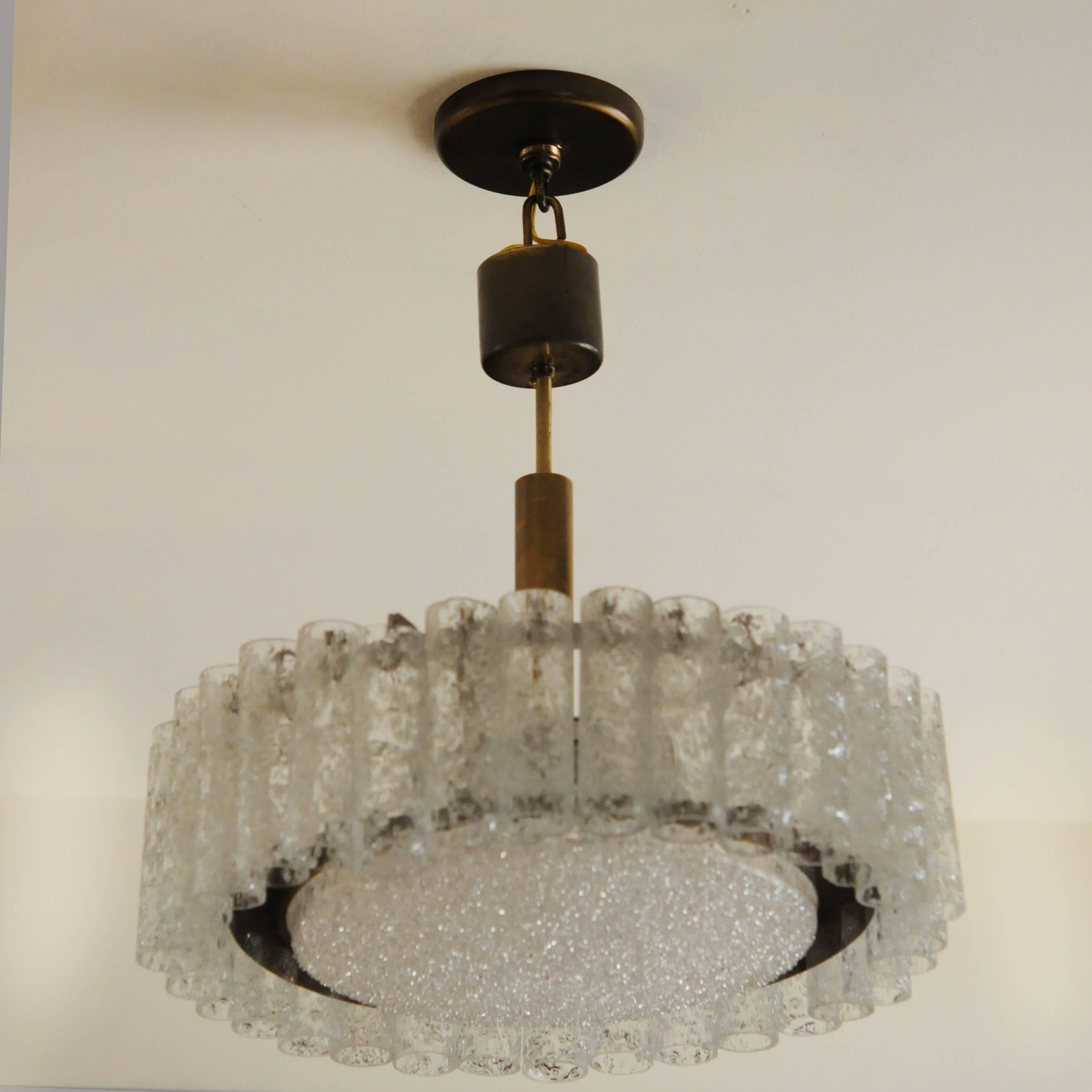 Murano glass chandelier with glass diffuser by Doria. Frame and canopy are brass.